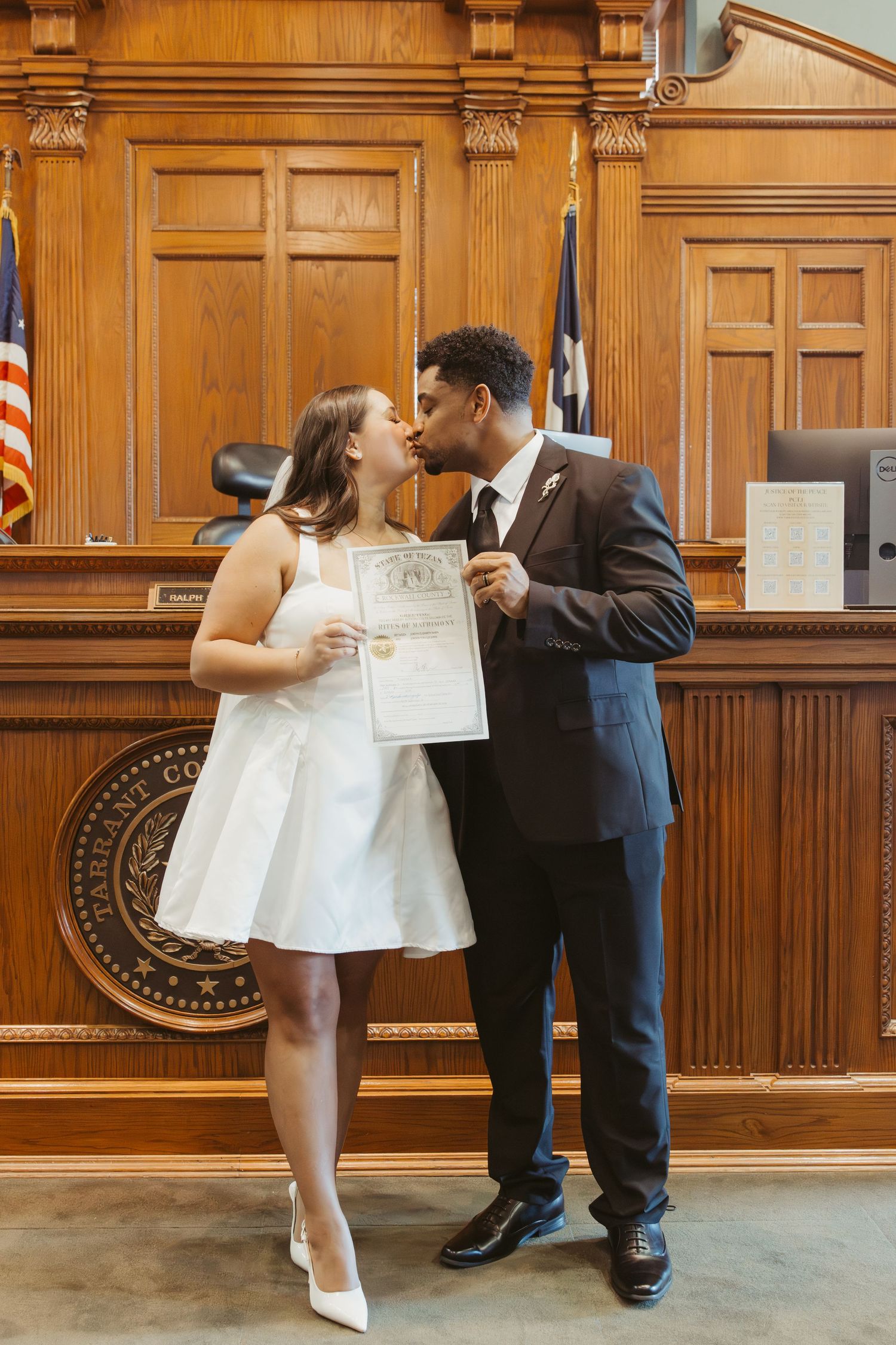 A sequence of joyful courthouse wedding photos showing a couple celebrating with their marriage certificate. Wedding Photographer DFW