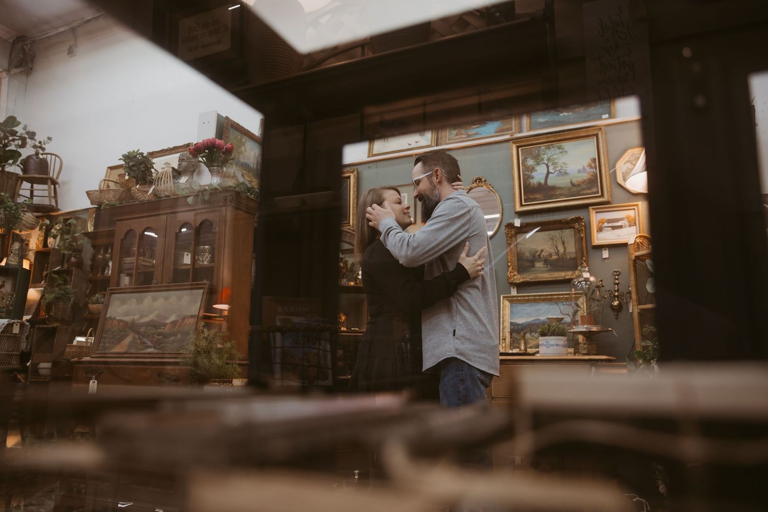 A cinematic series of photos showing a couple in a vintage car at sunset creating a romantic atmosphere.