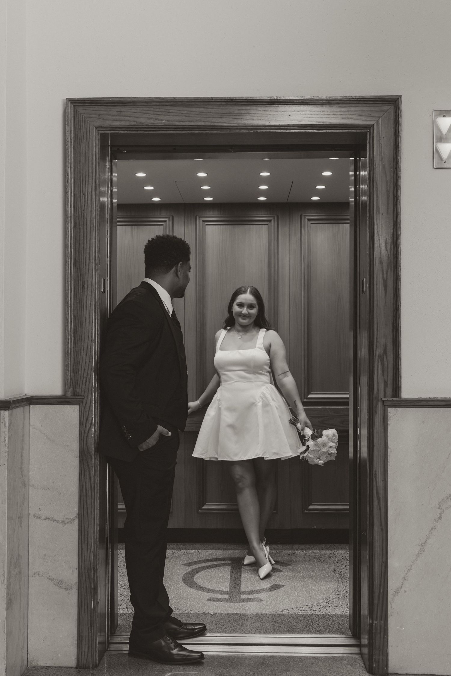 A series of wedding photos showing a couple having a playful moment near an elevator. Wedding Photographer DFW