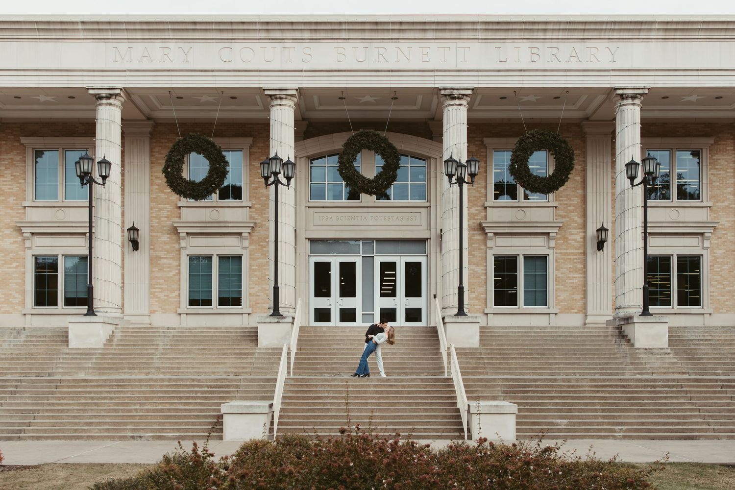 Candid engagement photos on TCU campus Fort Worth