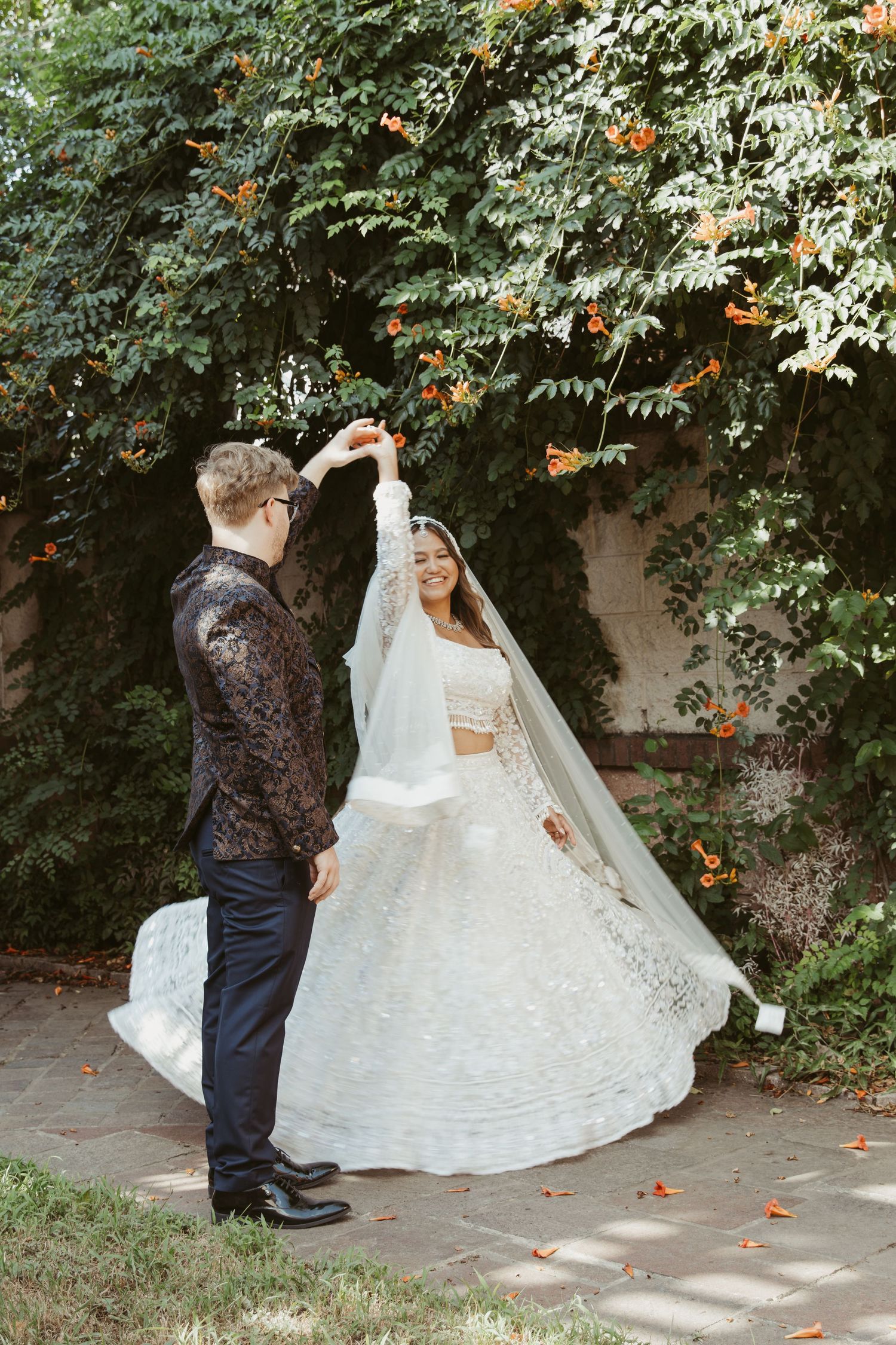 A romantic first look photo sequence showing a couple in wedding attire meeting in a garden pathway with autumn leaves.