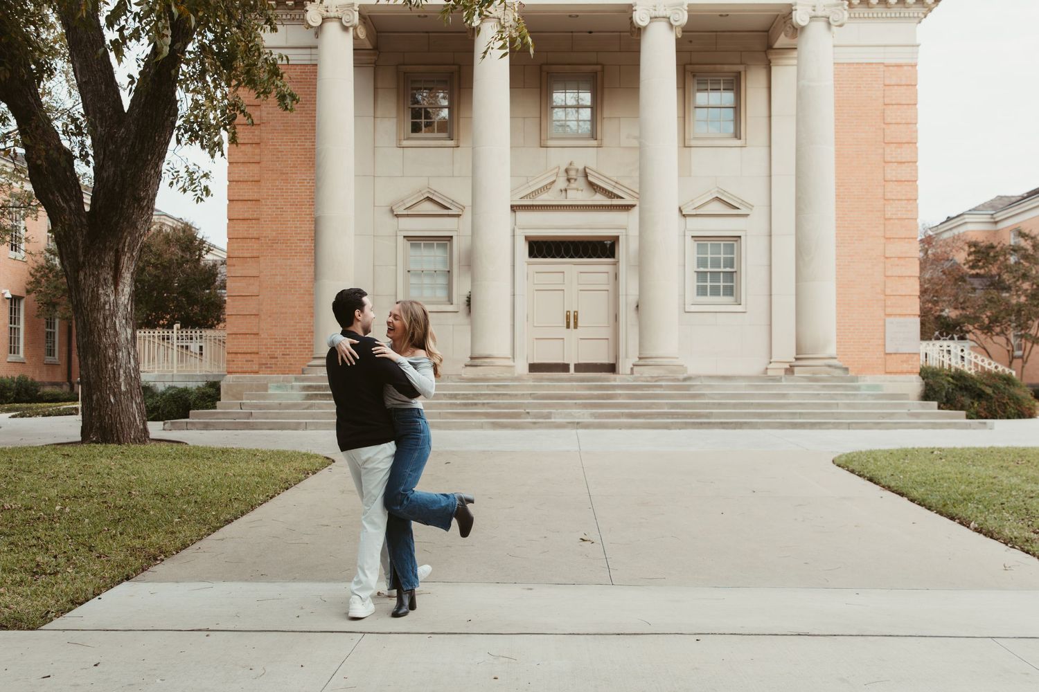 Candid engagement photos on TCU campus Fort Worth