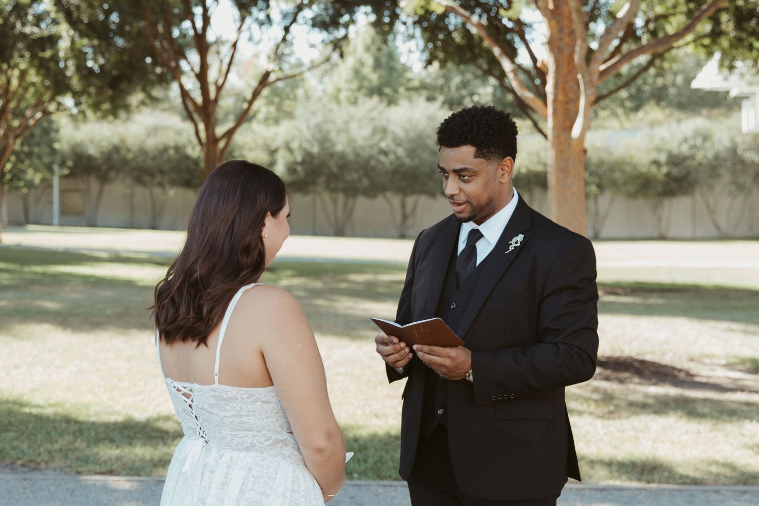 Outdoor formal portrait session under trees with natural lighting. Wedding Photographer DFW