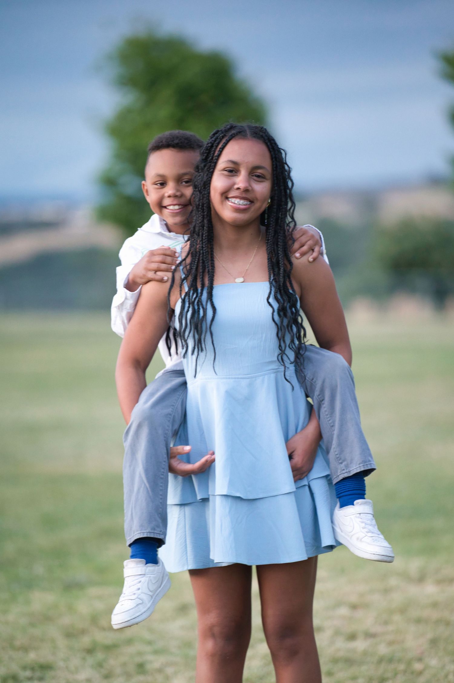 Children laughing during outdoor family photography session in Sacramento area