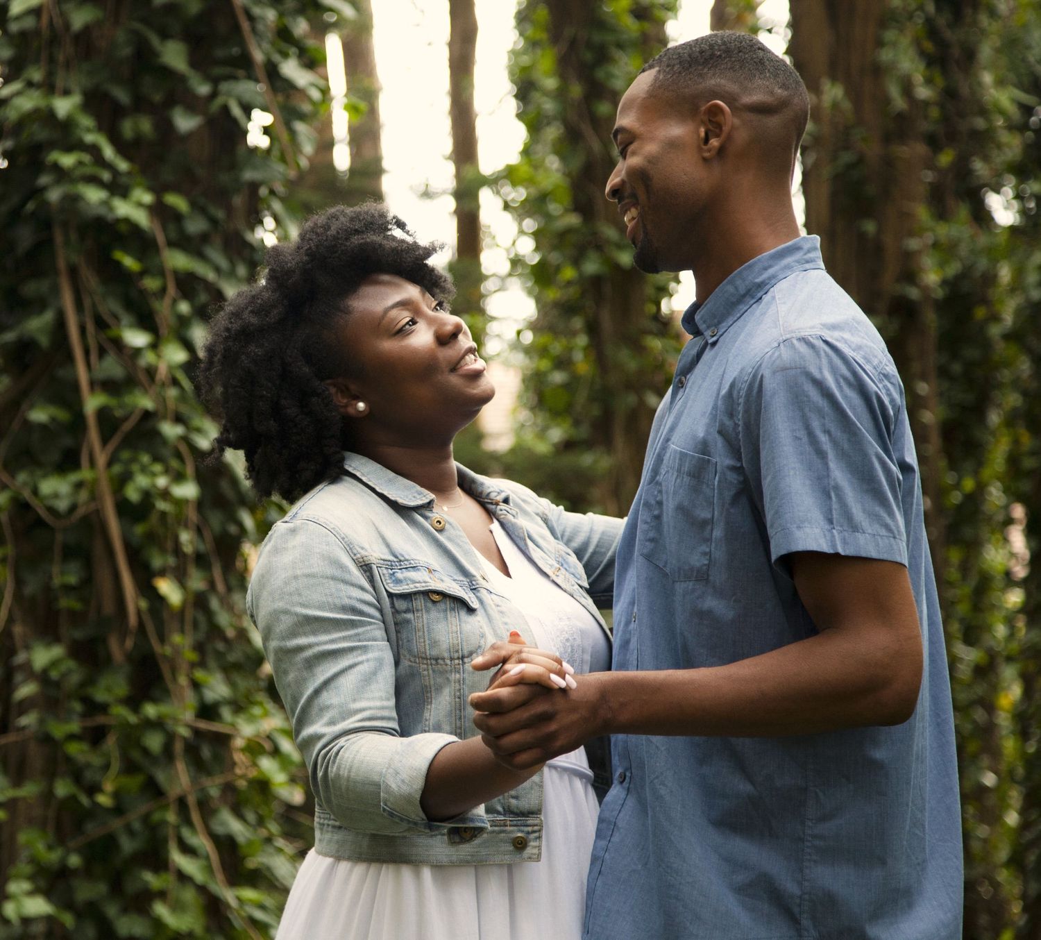 Engaged couple laughing together at lover's lane in san francisco, california.