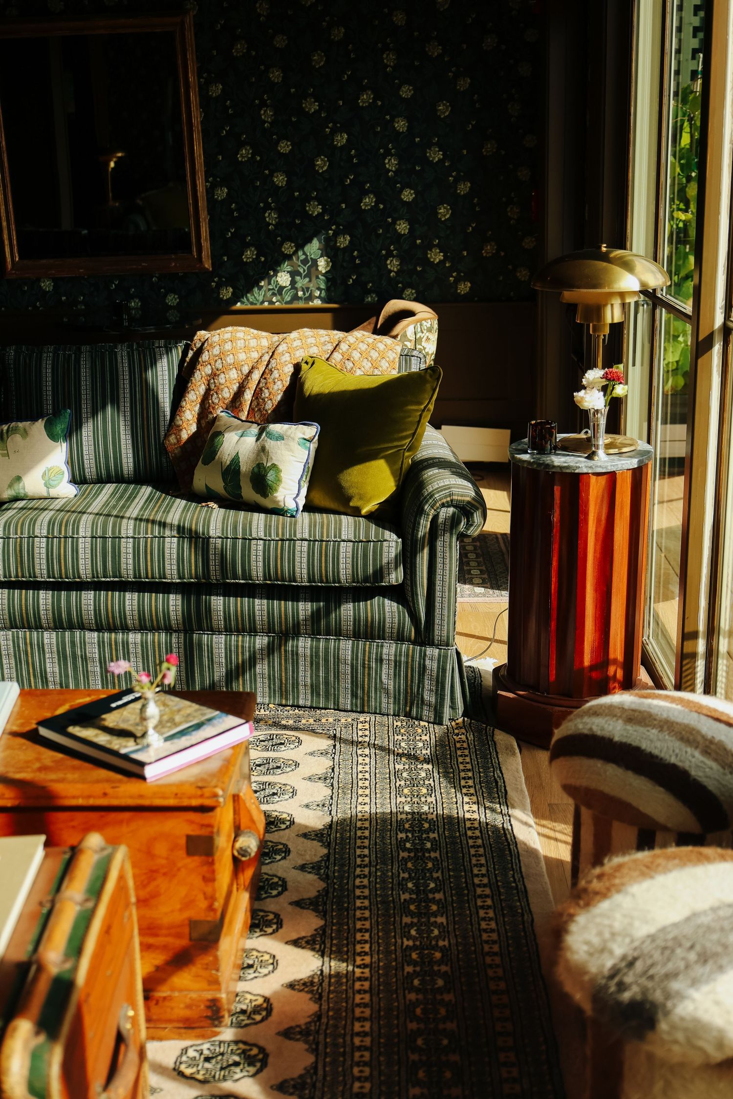 Boutique hotel lobby in Maine, highlighting cozy atmosphere and rich coloring