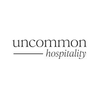Uncommon Hospitality logo featuring minimalist black serif typography on a white background.