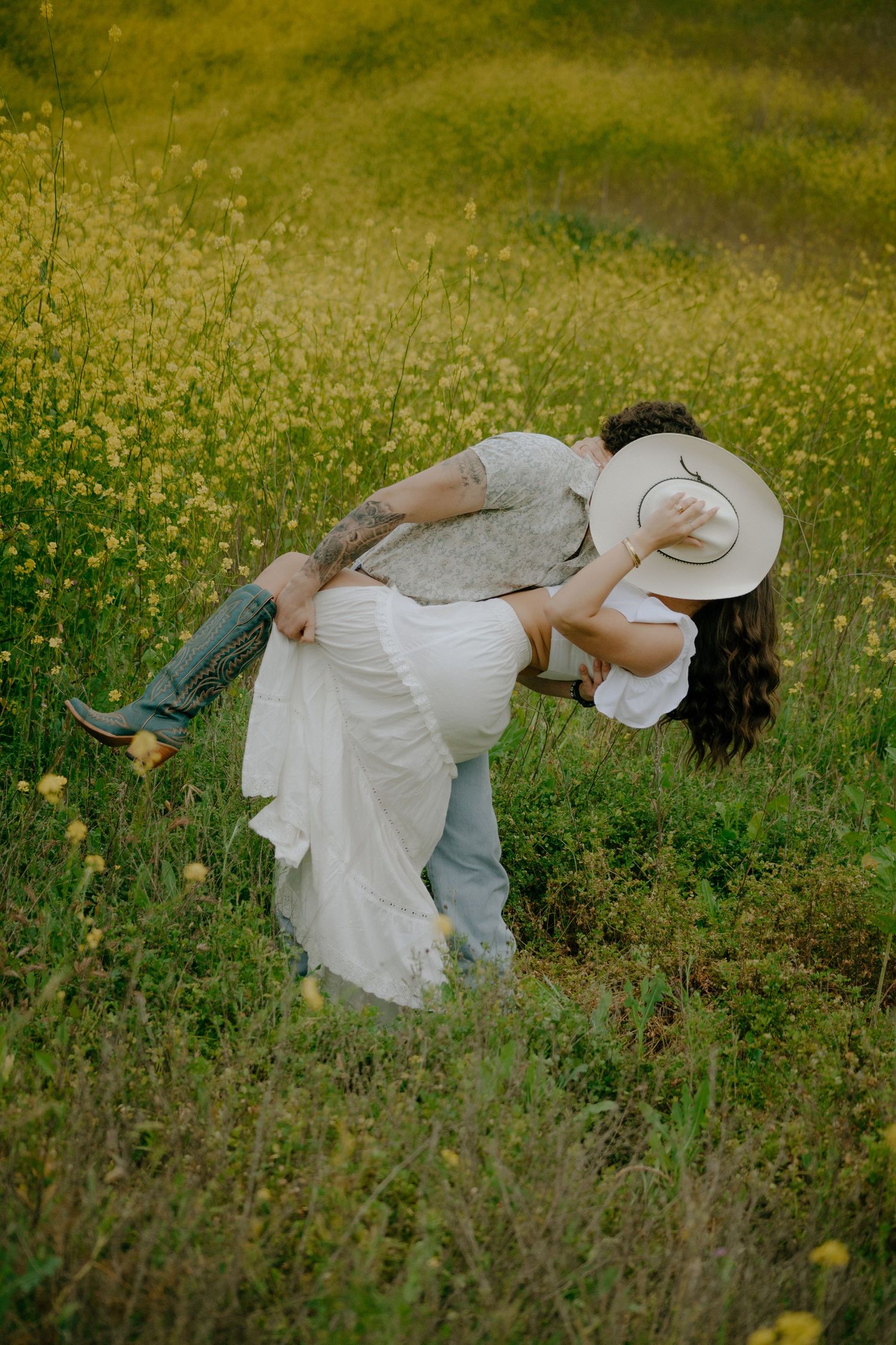 A person in a white dress appears to float weightlessly above a wildflower meadow in an artistic levitation photo sequence.