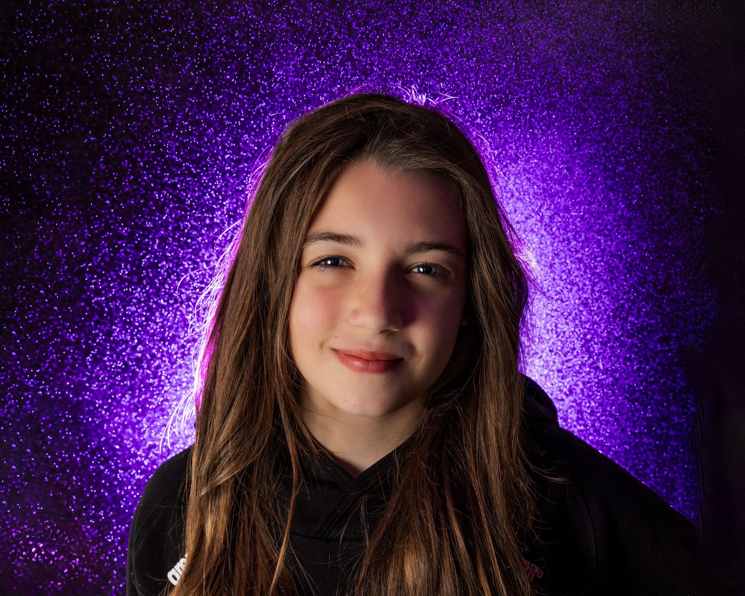A series of portraits with dramatic purple lighting and glowing effects creates a mysterious atmosphere.