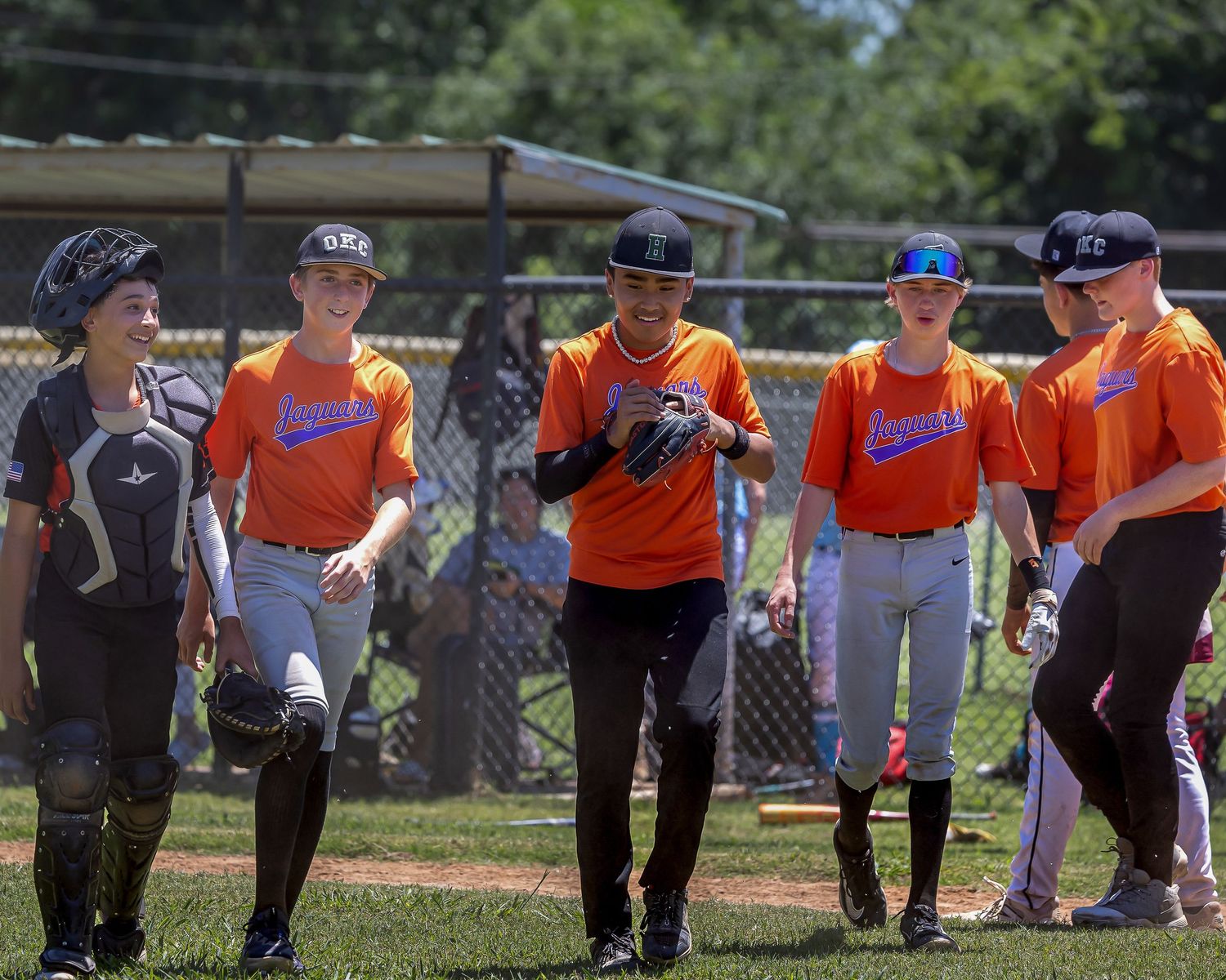 Baseball players in celebrate together during a game.