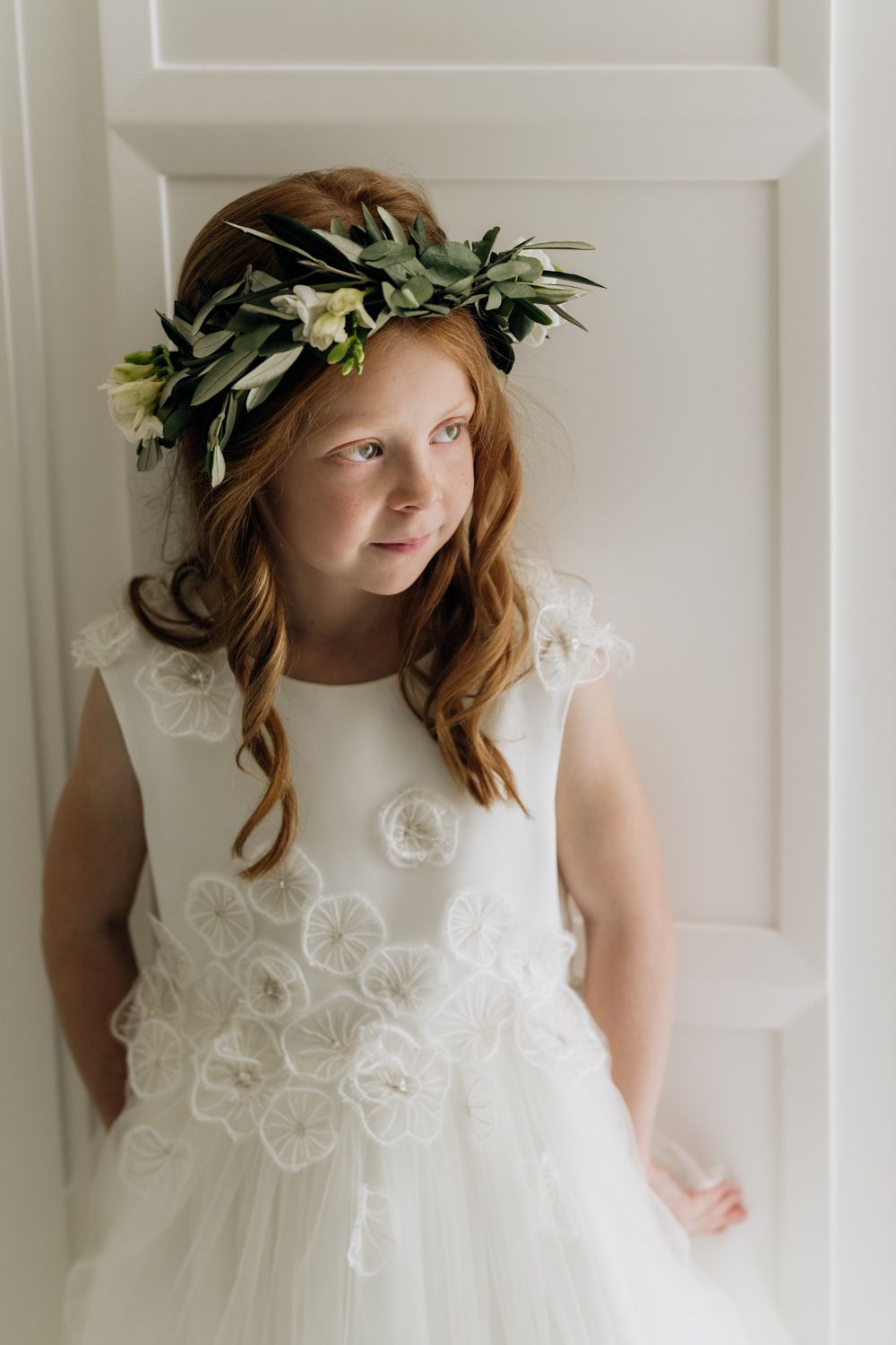 Flower girl by the door