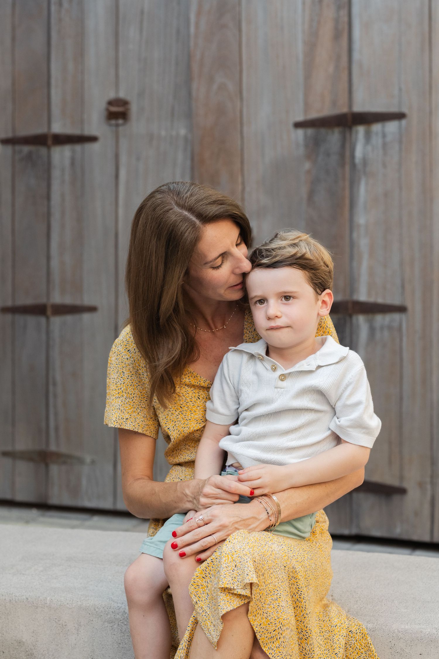 A tender moment captured in a series of photos showing affection and connection.