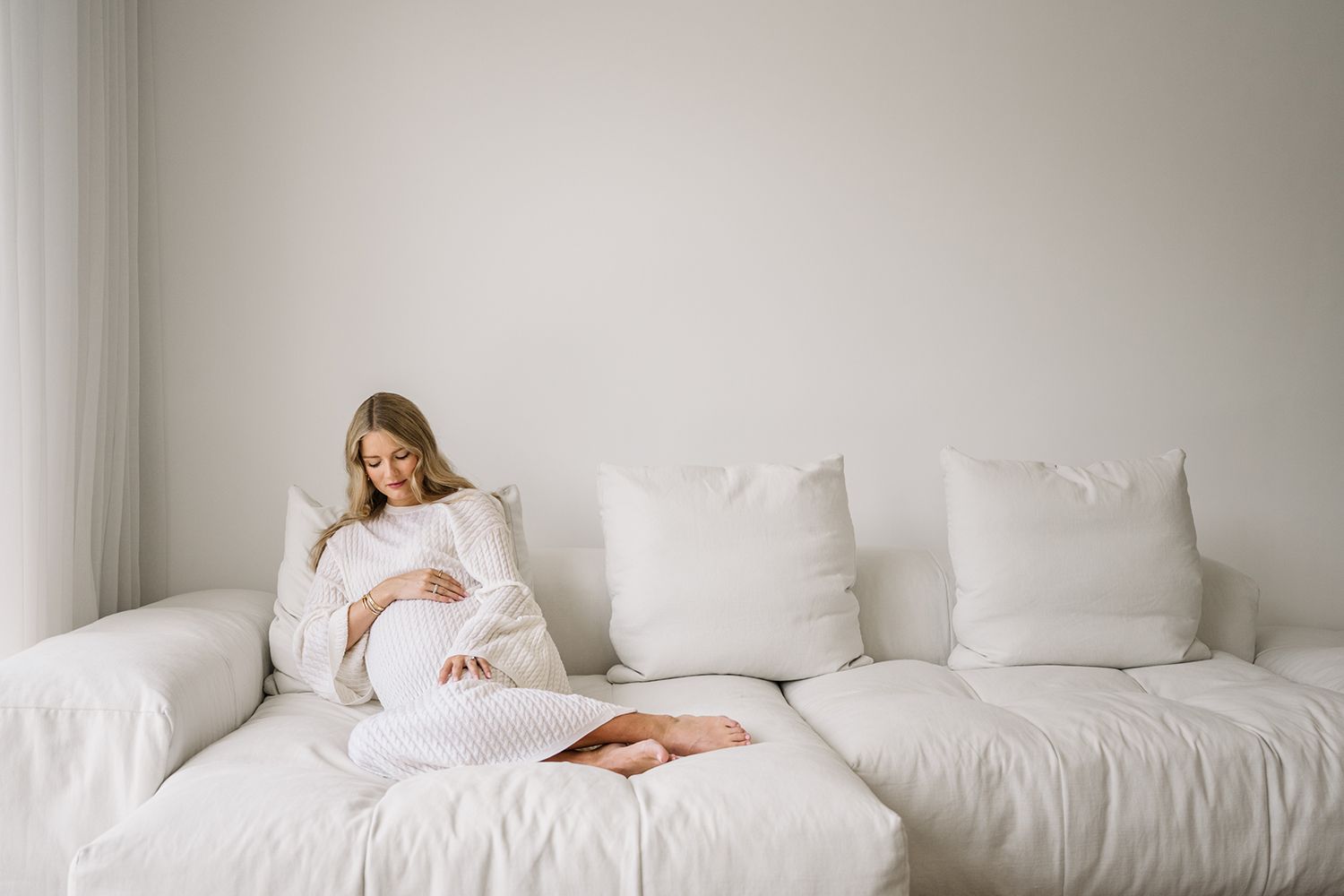 maternity photo session at home white dress