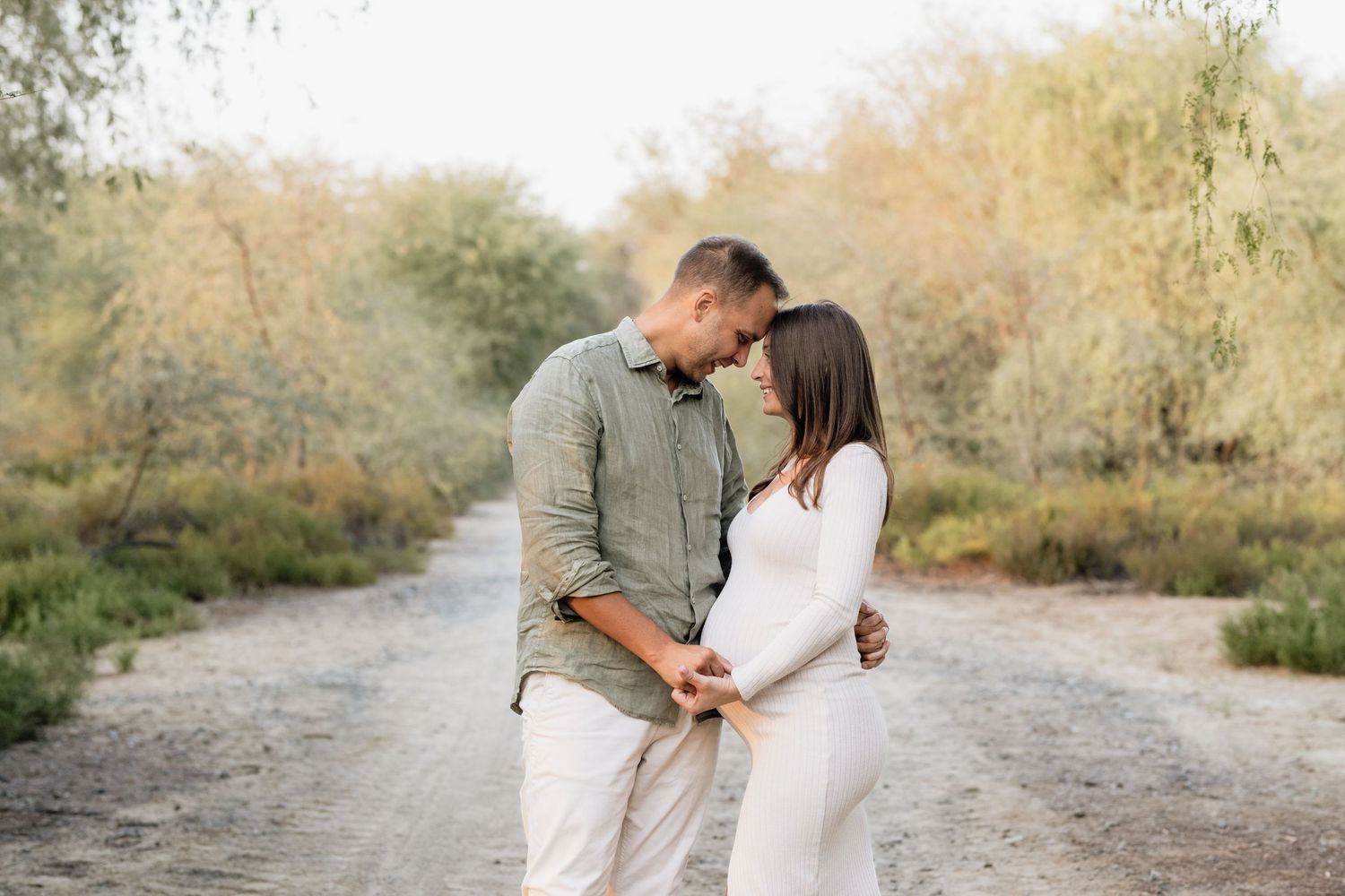 Candid family moments captured on a natural desert path.