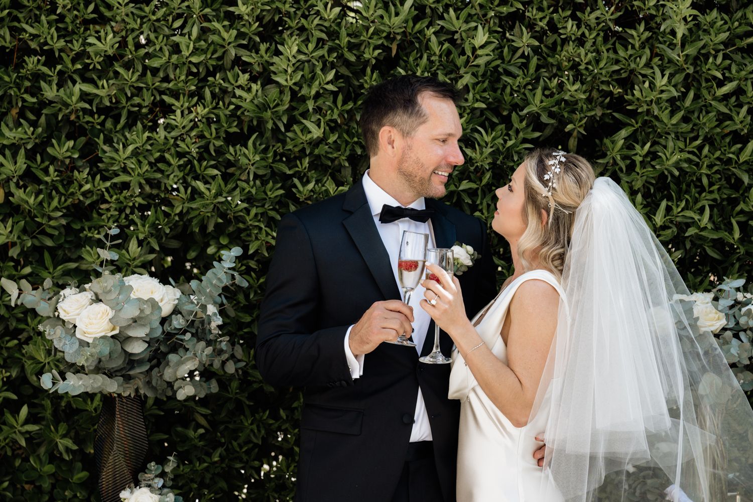 Small wedding garden ceremony couple cheering