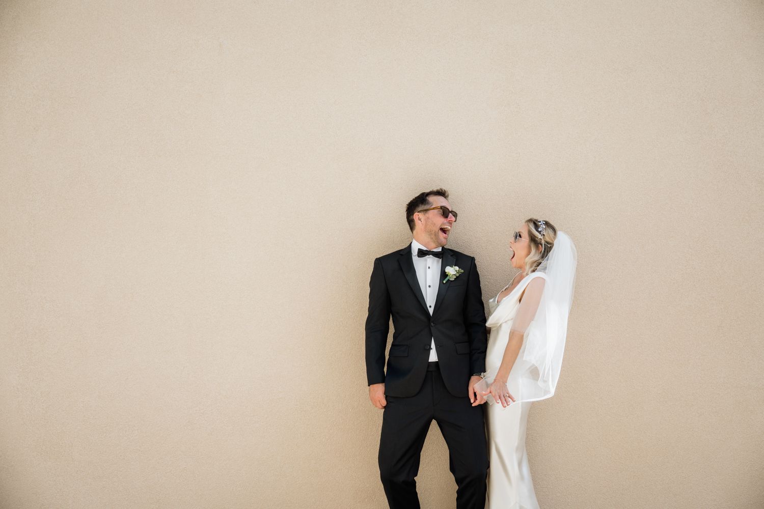 Minimalistic wedding couple portrait fun