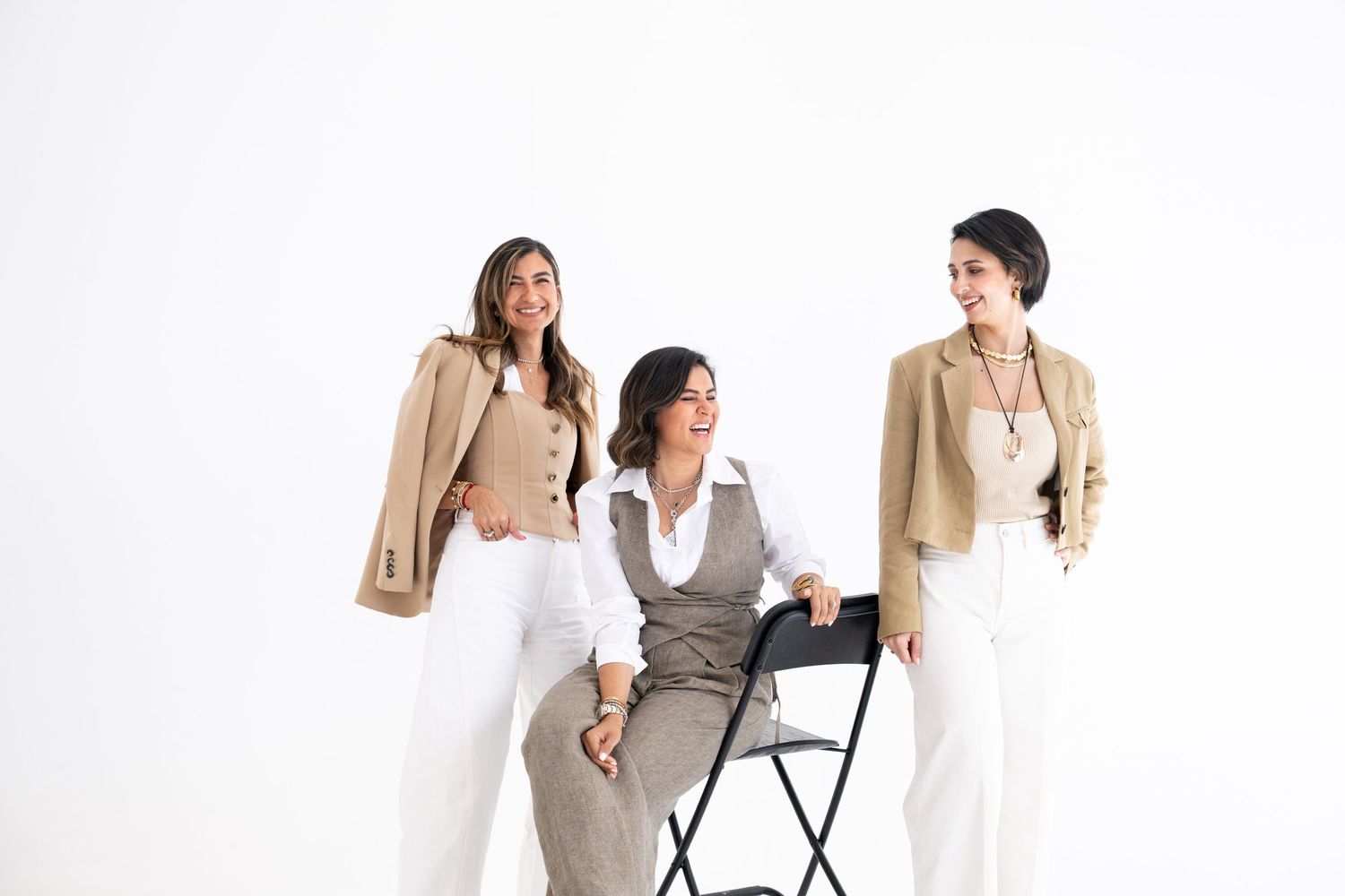 Professional business meeting in bright modern office space with minimalist decor.