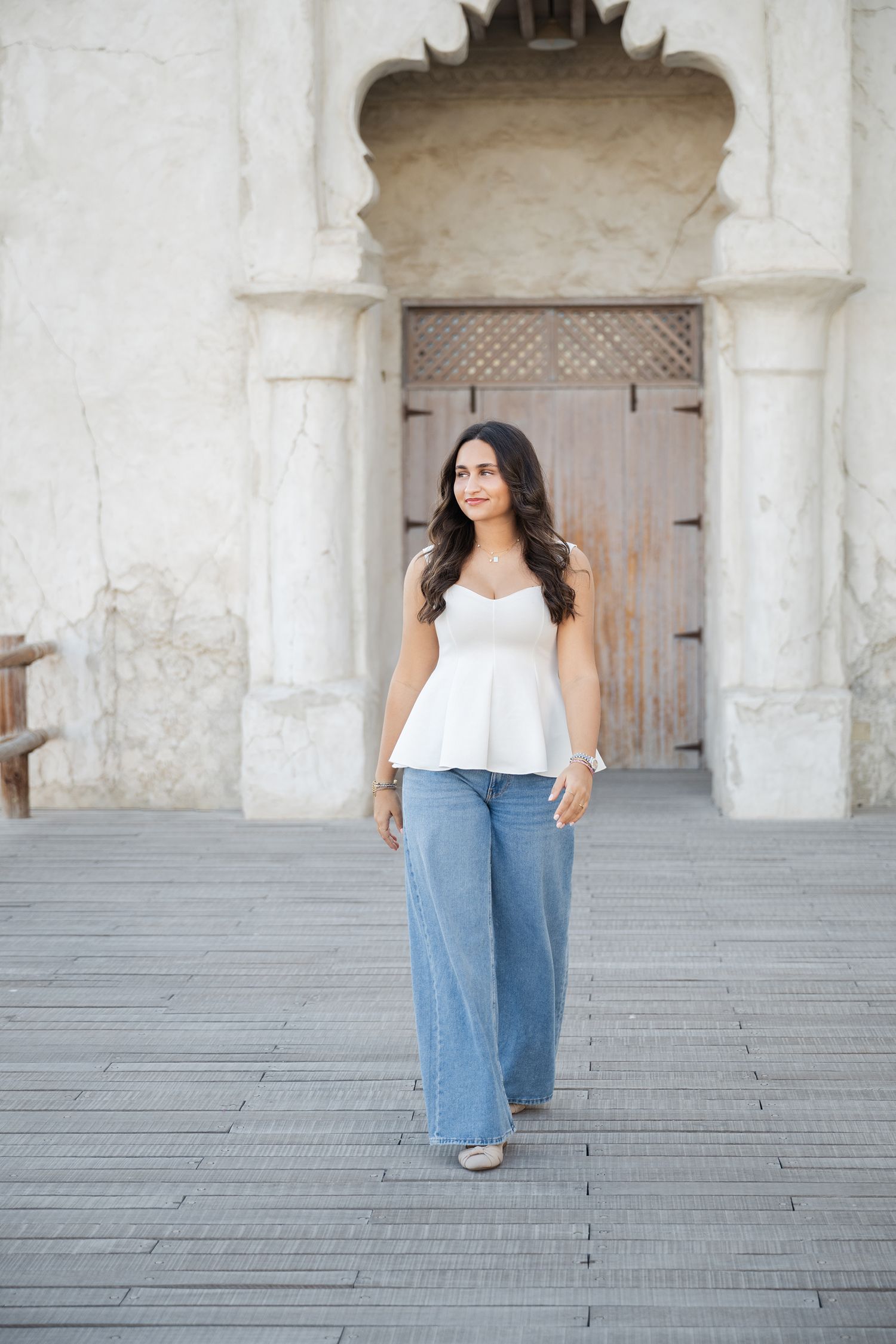 Senior session girl in Al Seef Dubai walking