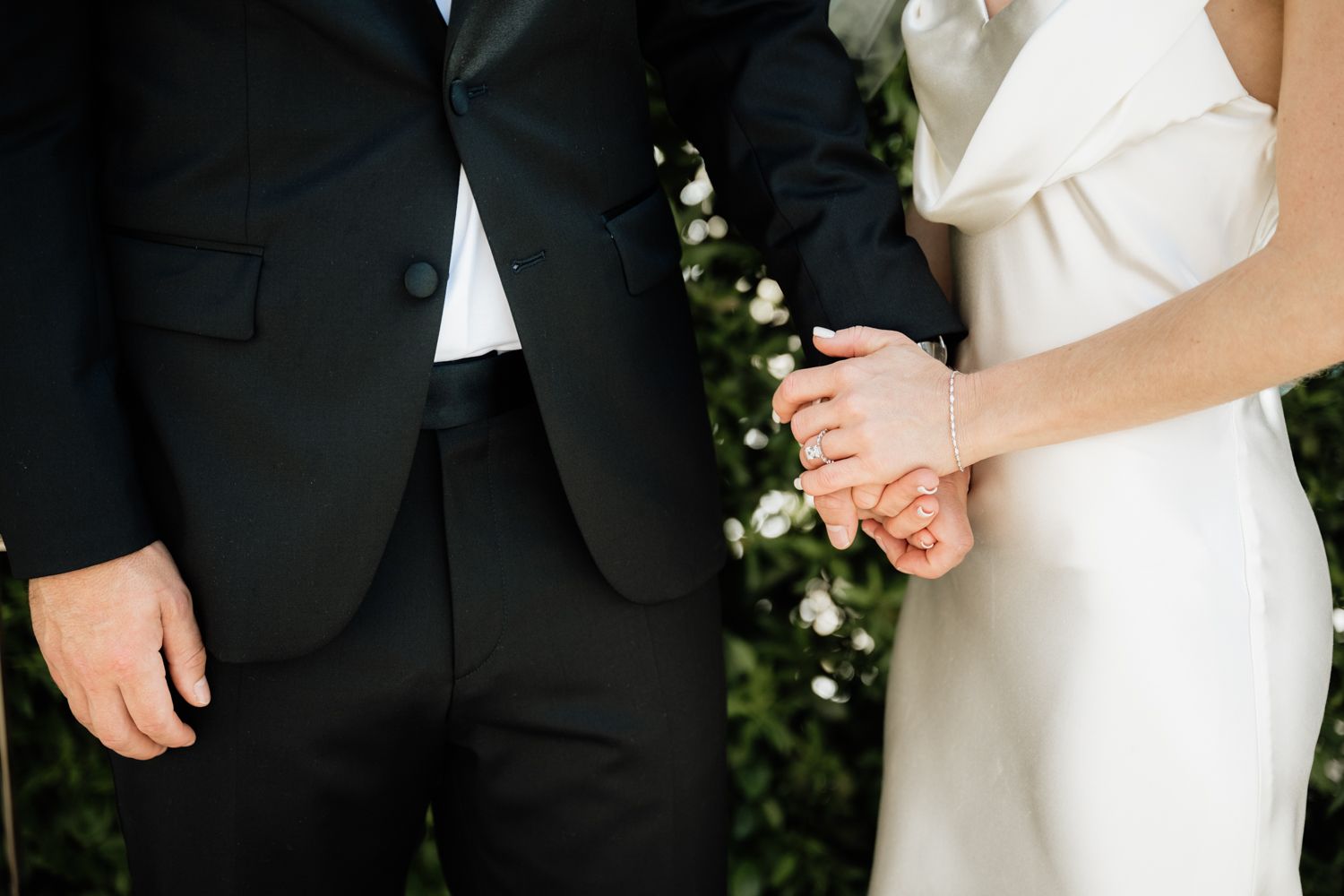 Small wedding garden ceremony hand details