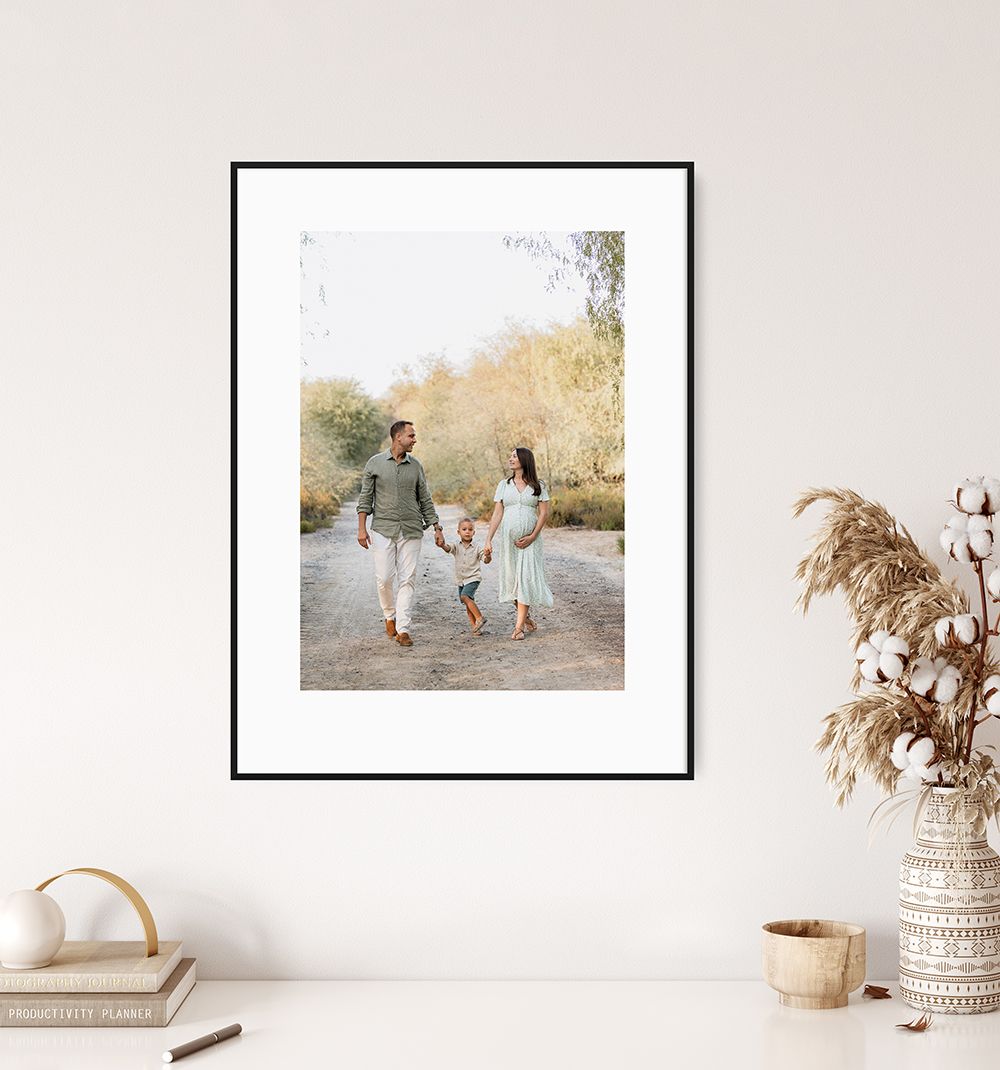 Minimalist home decor display with framed family photo by Celine Grassy photography