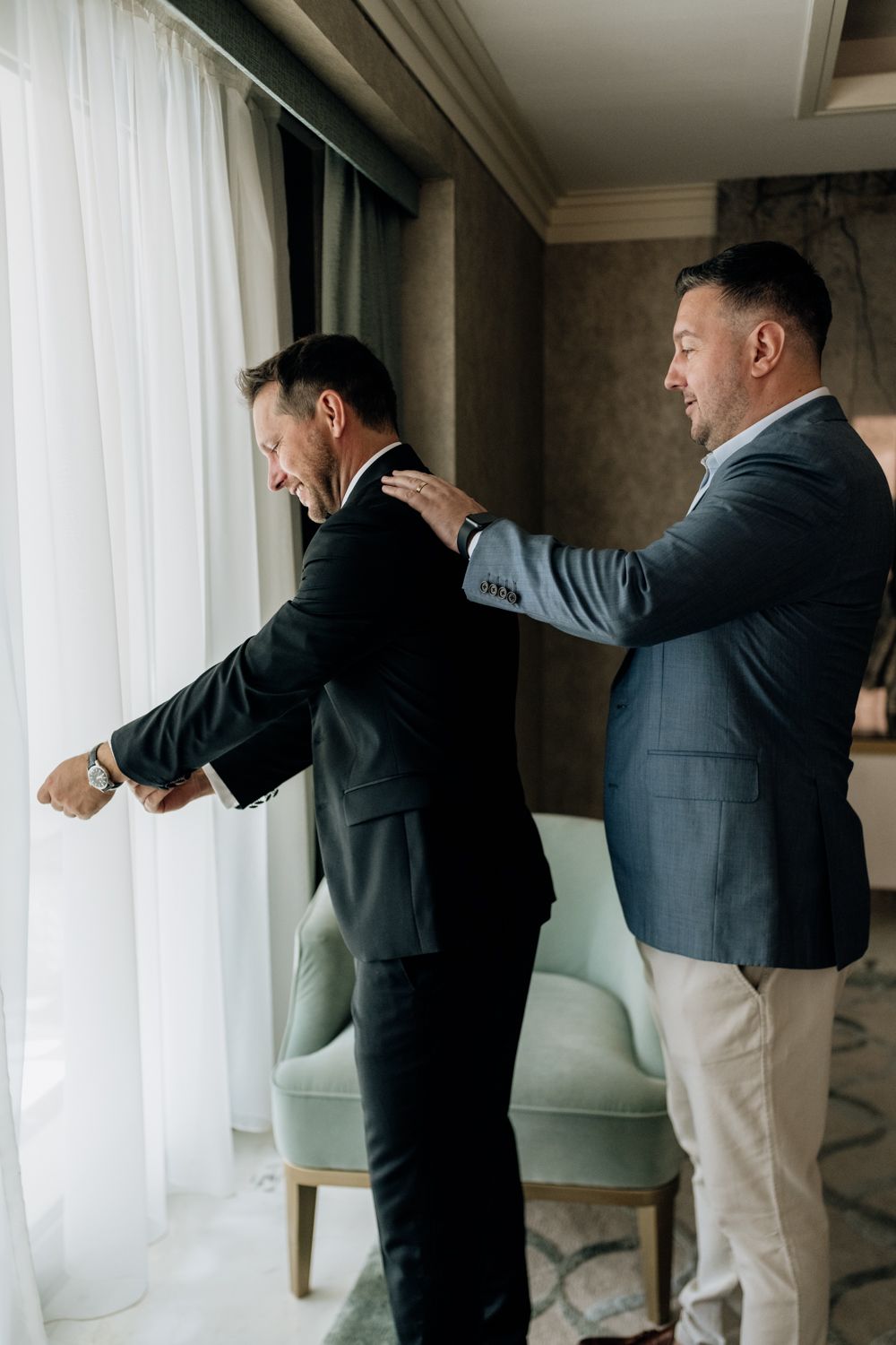 Groom getting ready jacket
