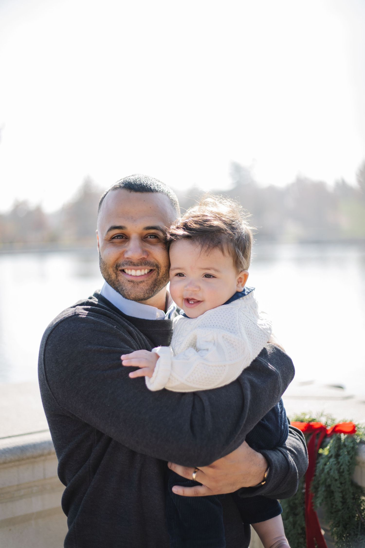 A series of joyful outdoor portraits showing warm embraces against a bright background.