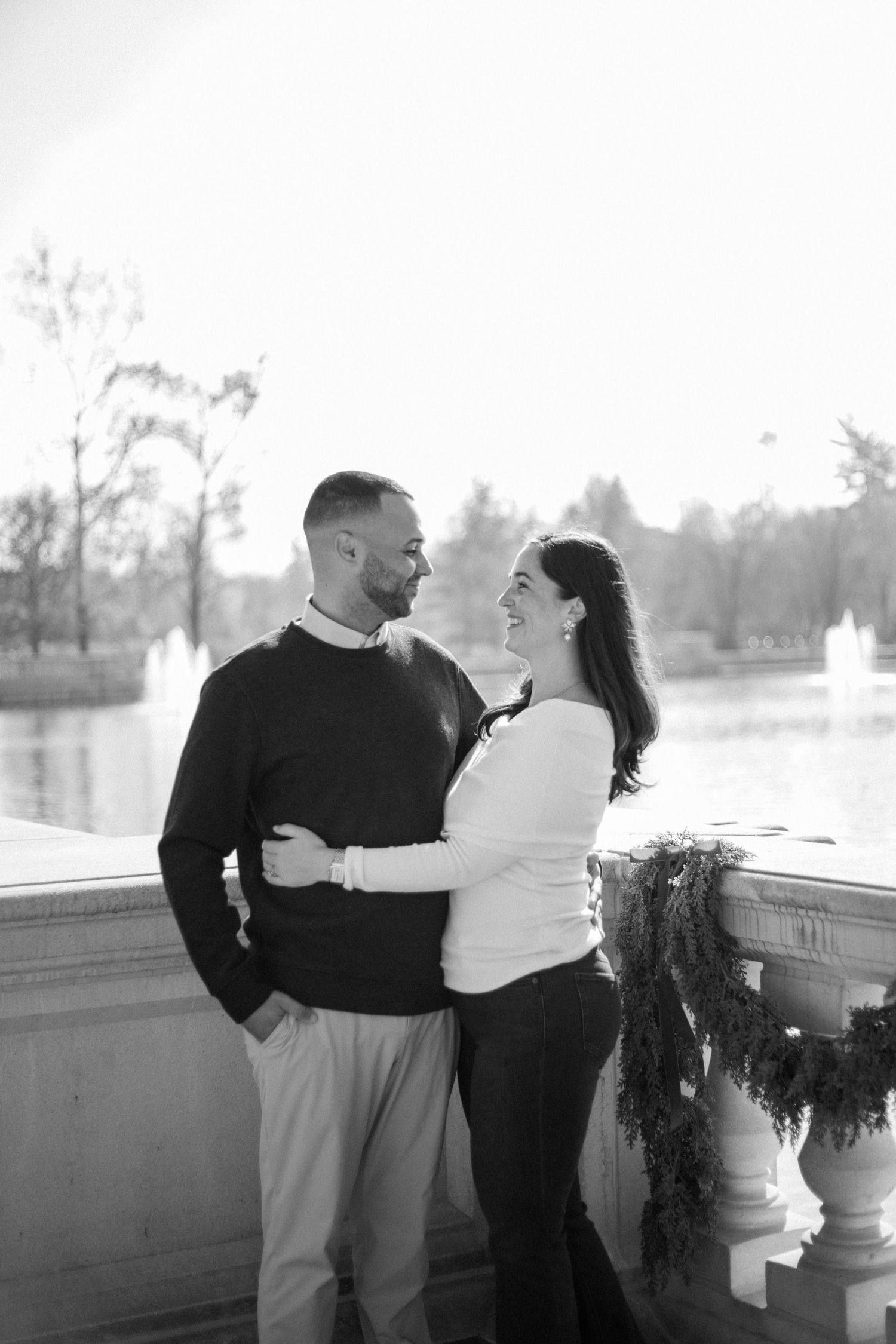Intimate family moments captured during an outdoor photo session with holiday decor.