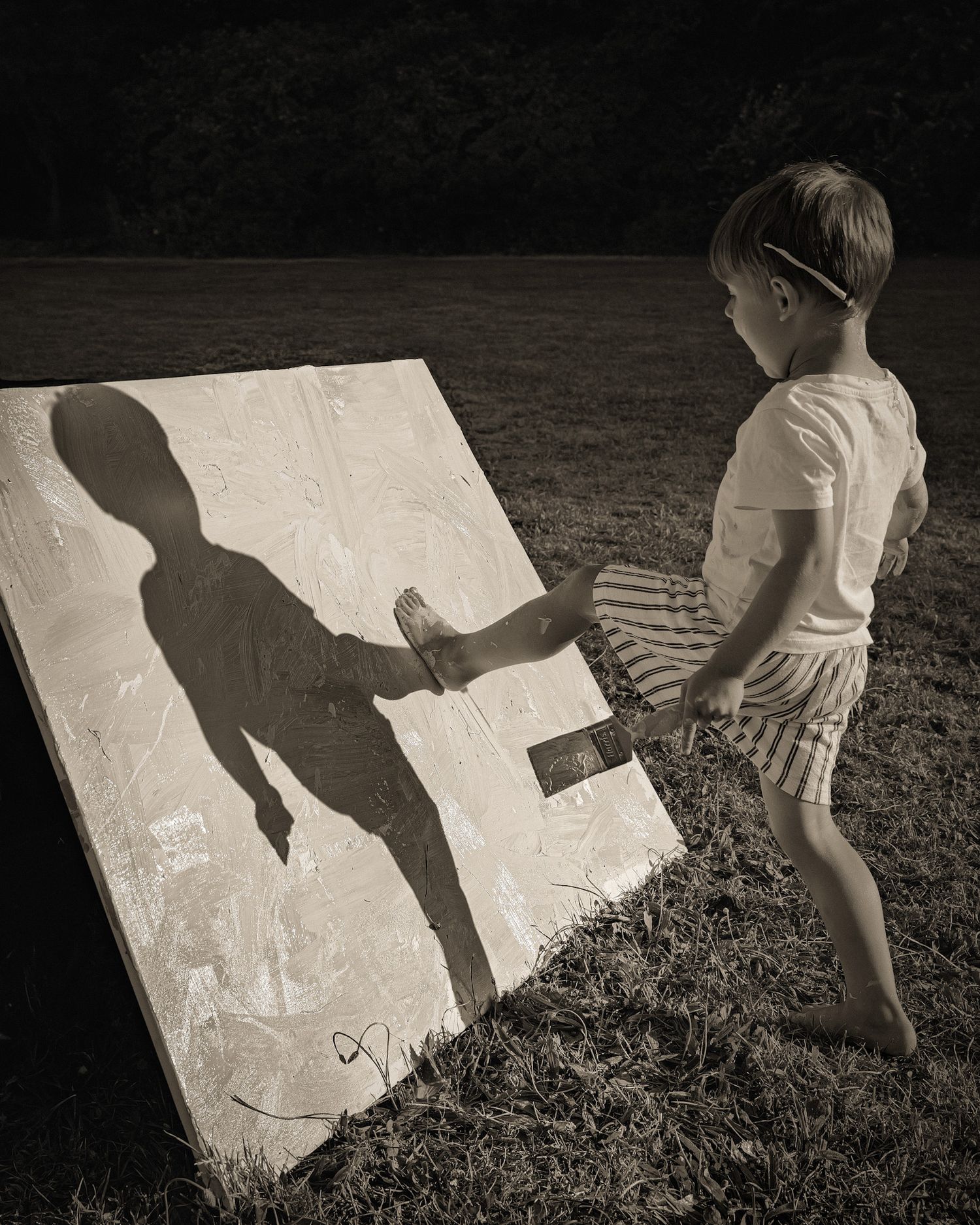 Series showing shadows cast on a white surface outdoors.