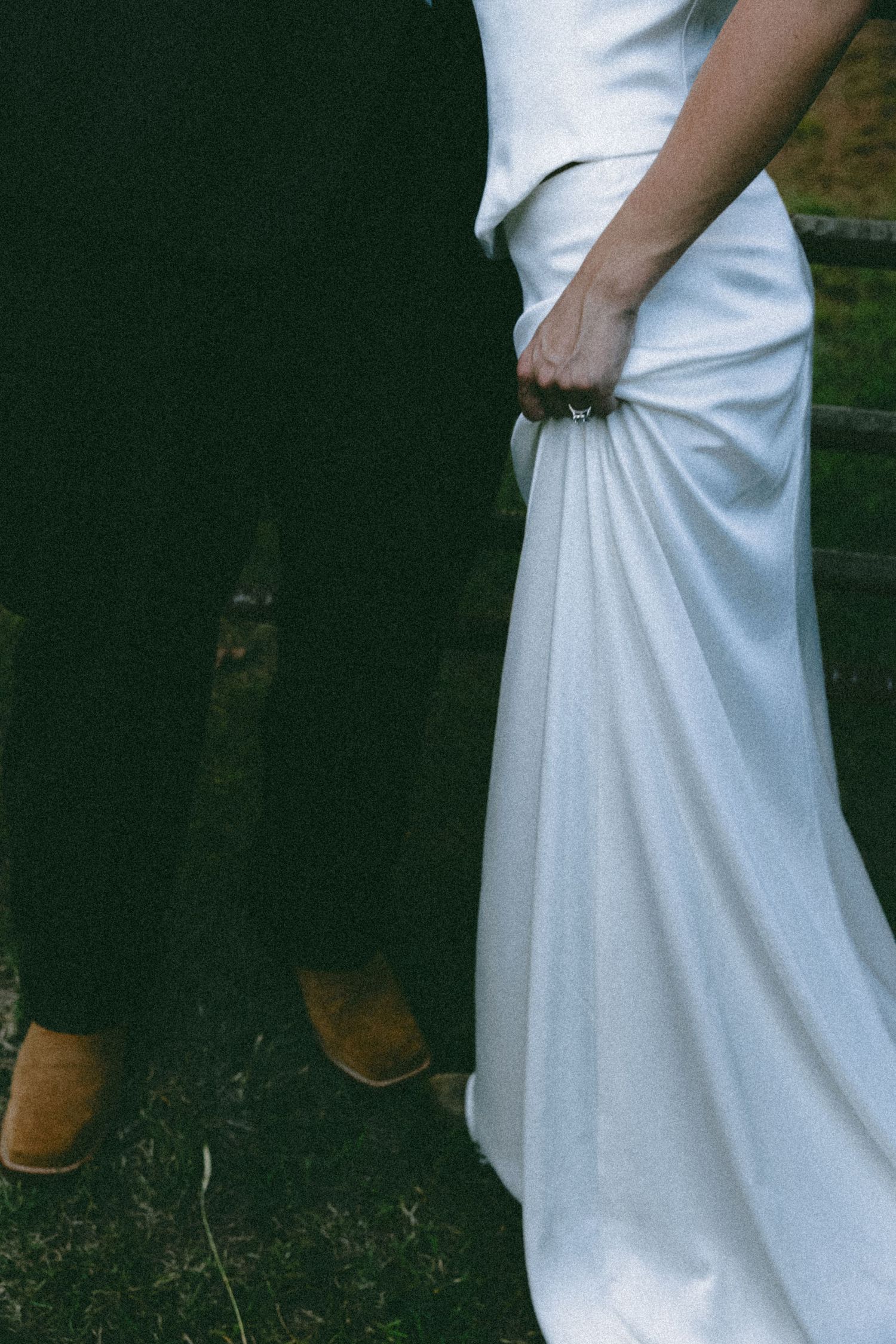 White wedding dress details shown in a series of cropped shots against a dark background.