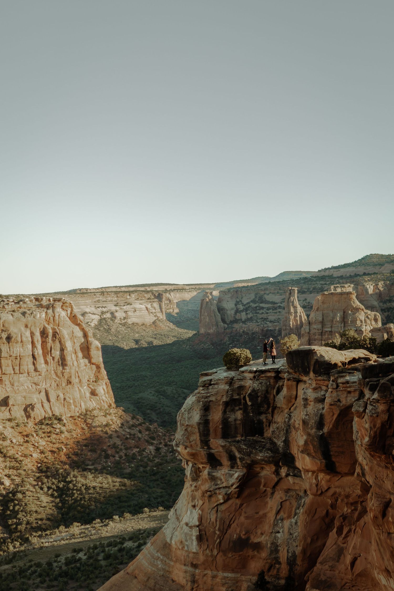 colorado national monument engagement photography, scenic mountain view with couple on mountain engagement photography