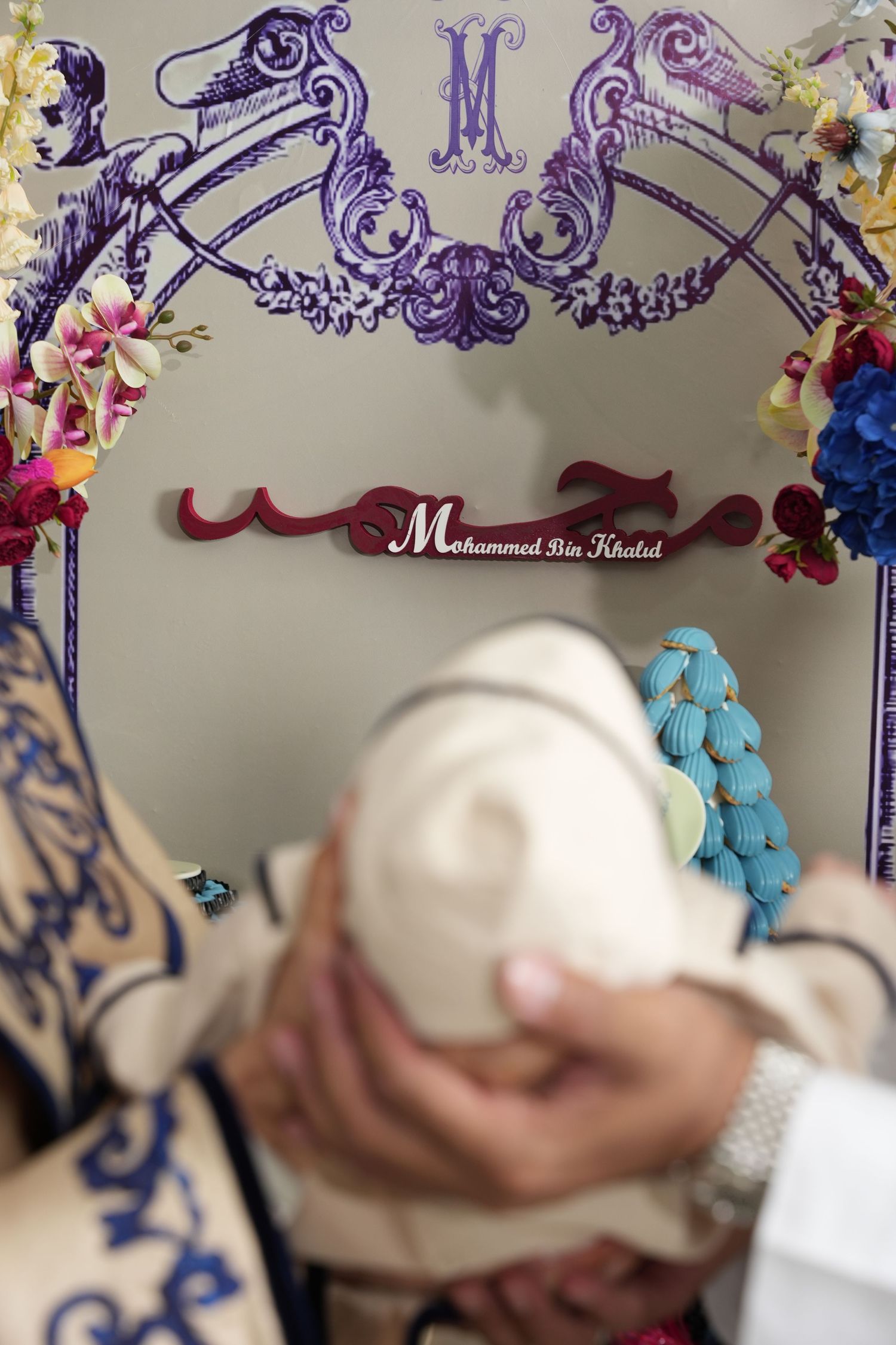 An artistic series of wall art featuring purple ornate calligraphy designs and decorative patterns.