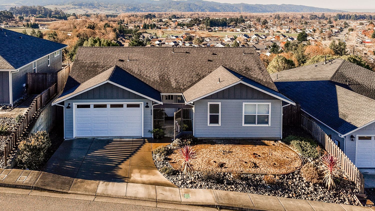 Aerial photo front elevation high, real estate single family home, Fortuna CA.