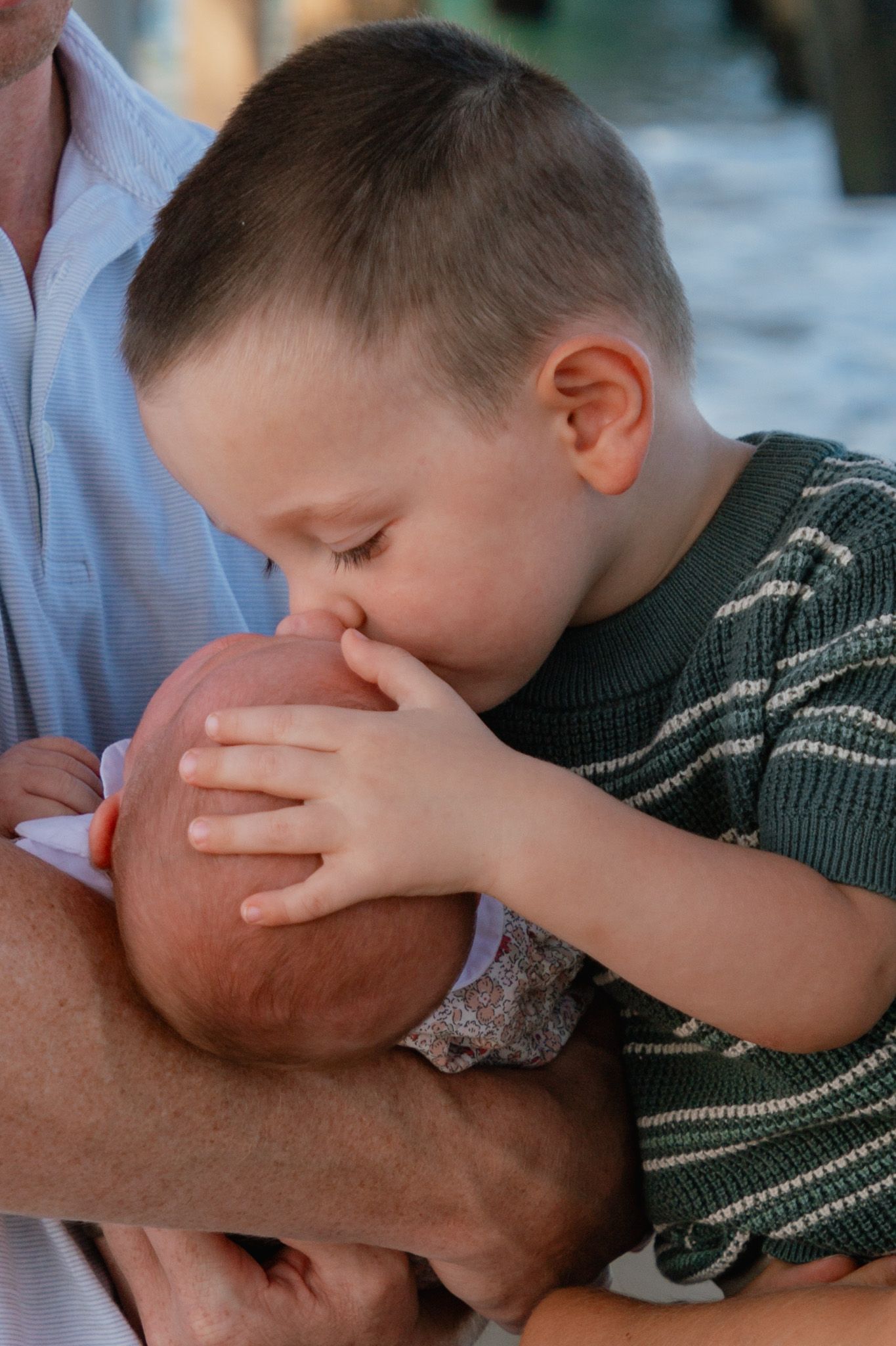 brother and baby sister family photos by the beach
