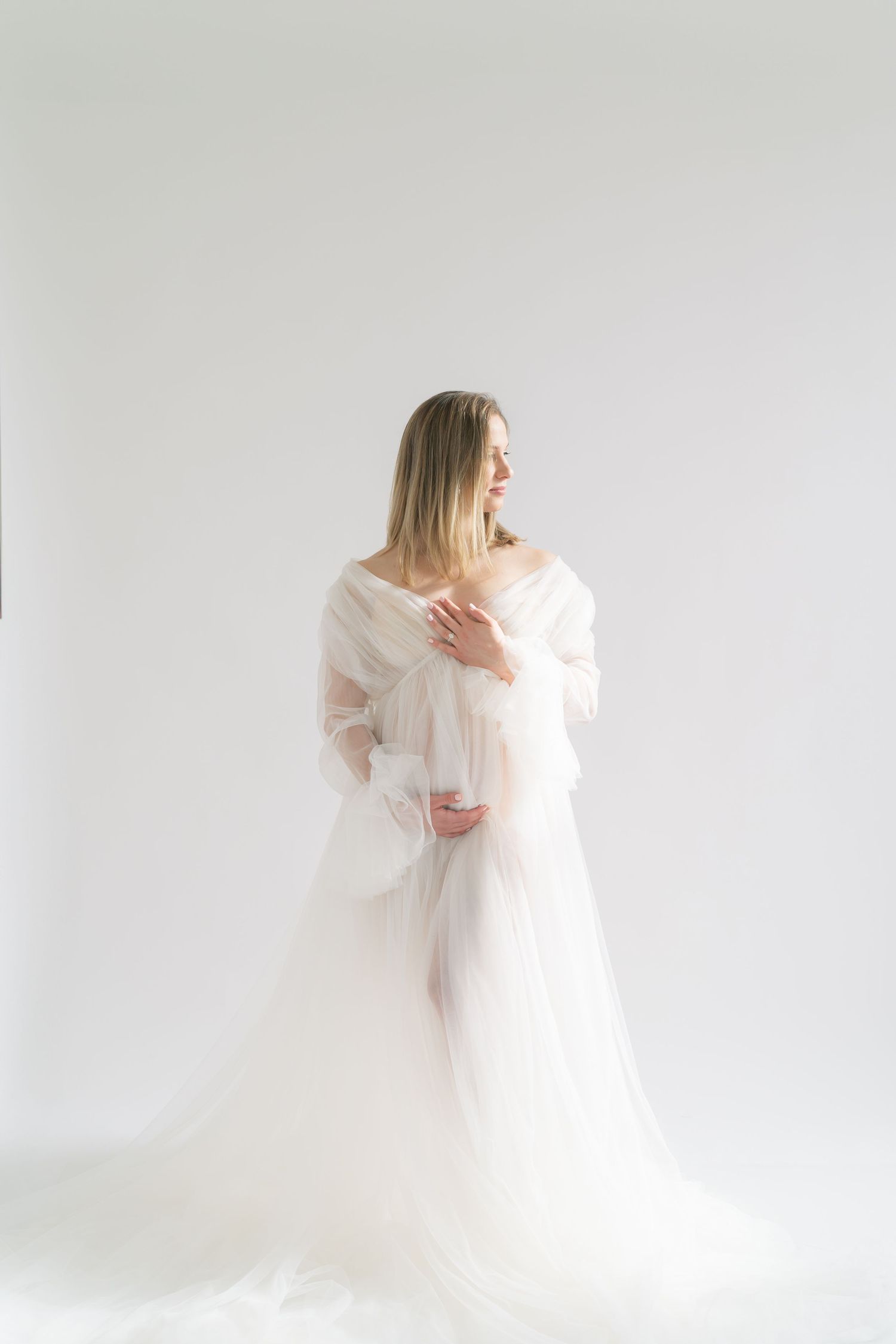 Maternity photography for Chicago and Northwest Indiana mothers in a natural light Valparaiso studio.