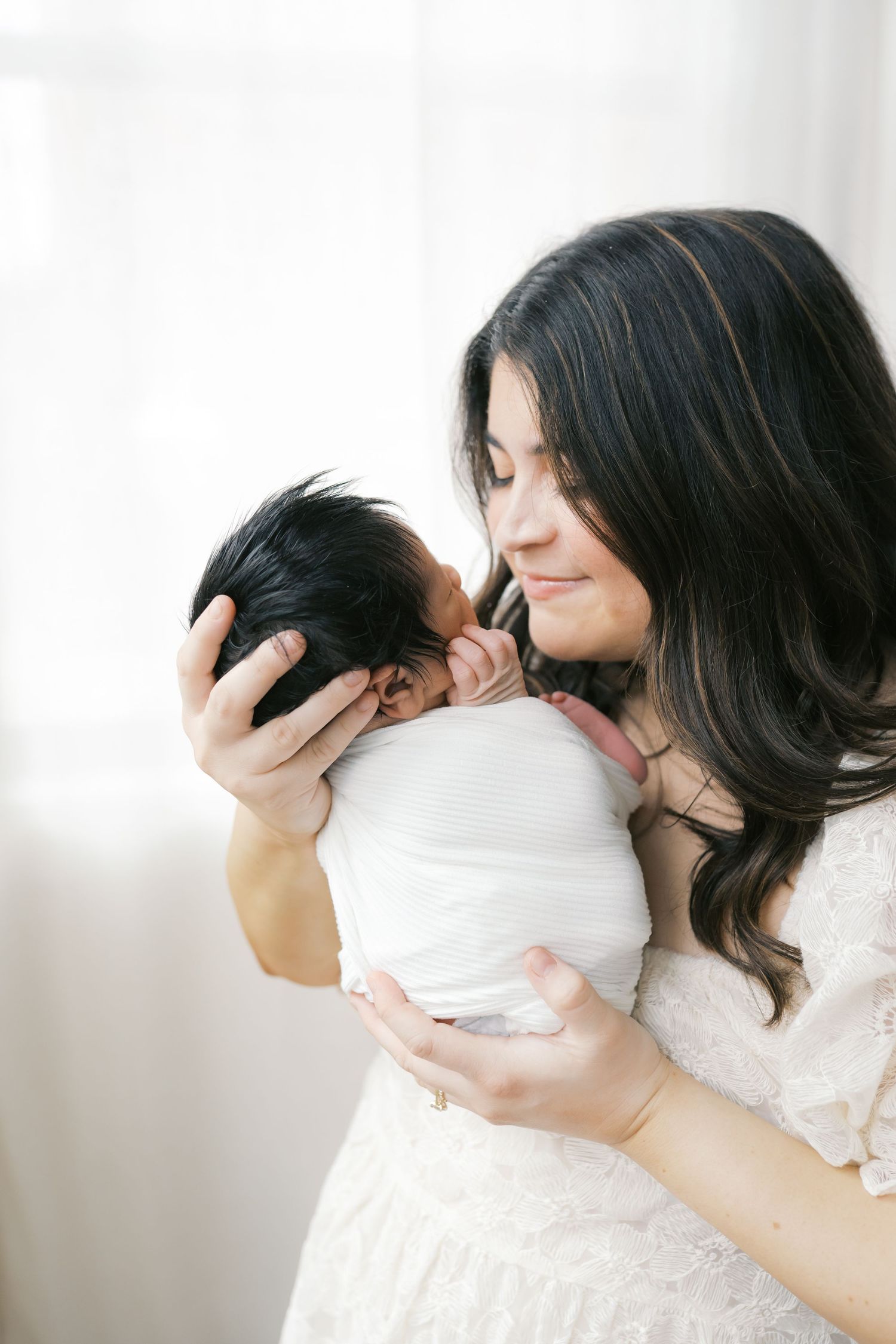 Valparaiso, Indiana newborn photographer capturing soft, natural studio portraits of a newborn baby