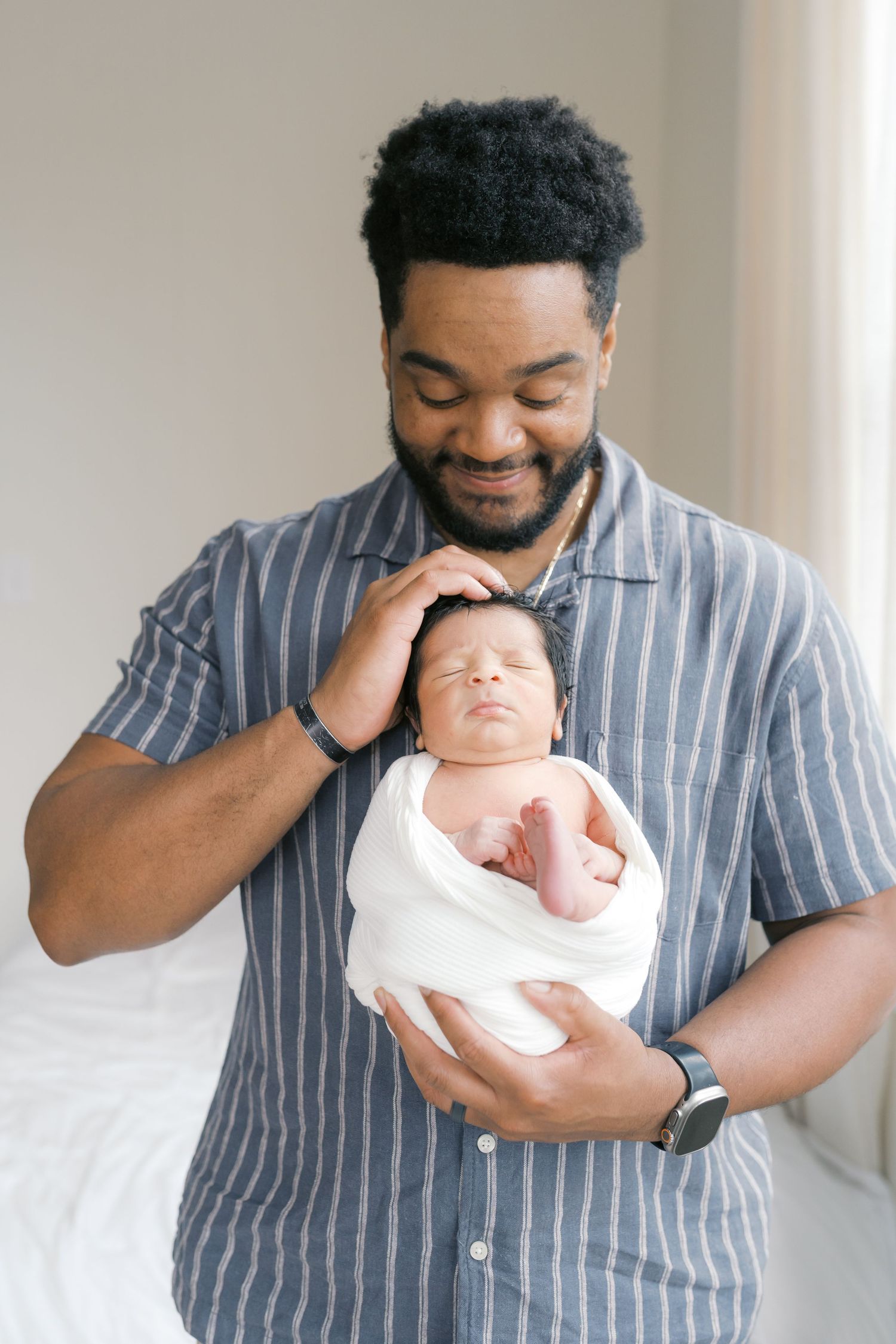 Timeless newborn studio photography in Valparaiso, Indiana with soft light and neutral styling