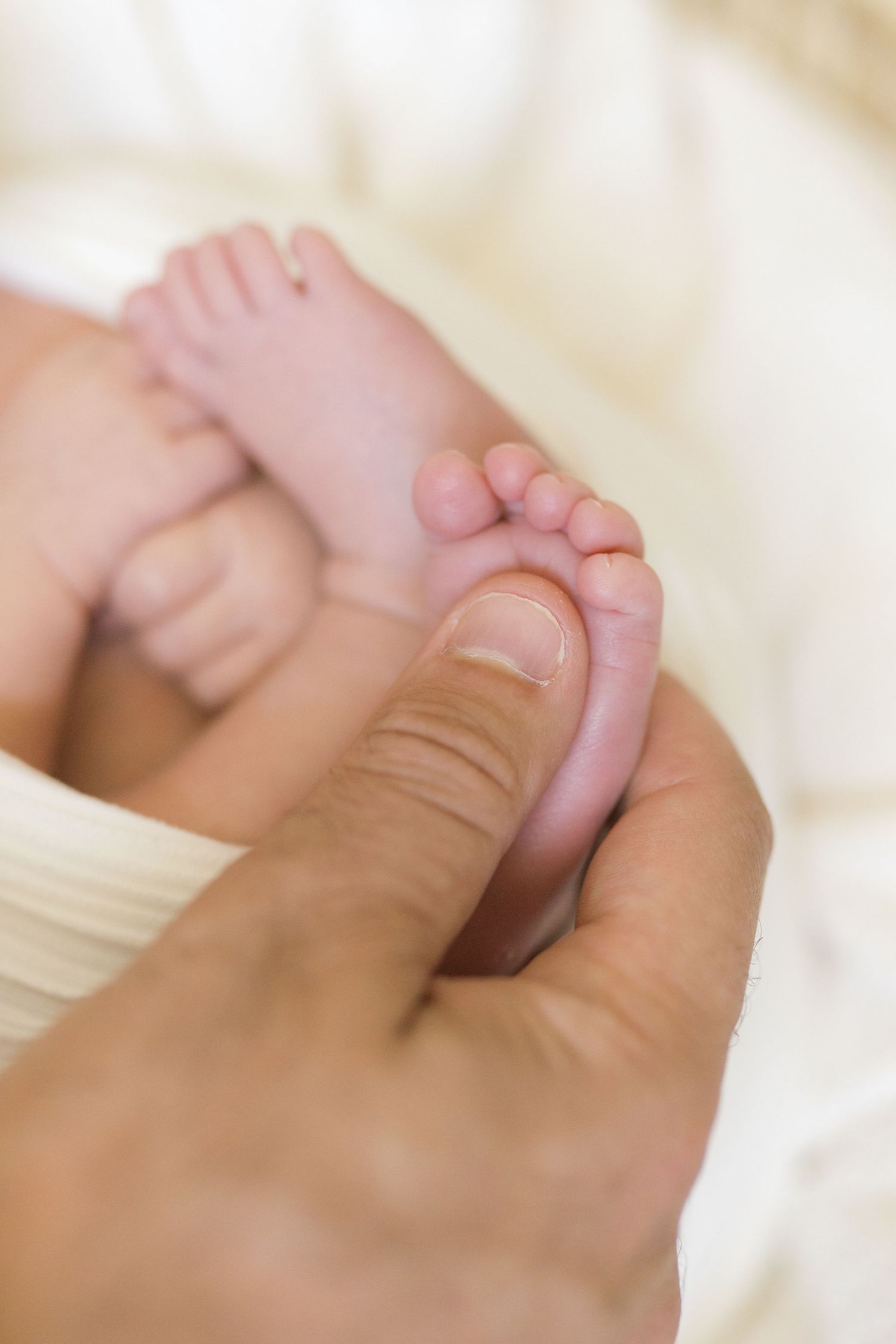 At-home newborn photography session in Valparaiso, Indiana for growing families.