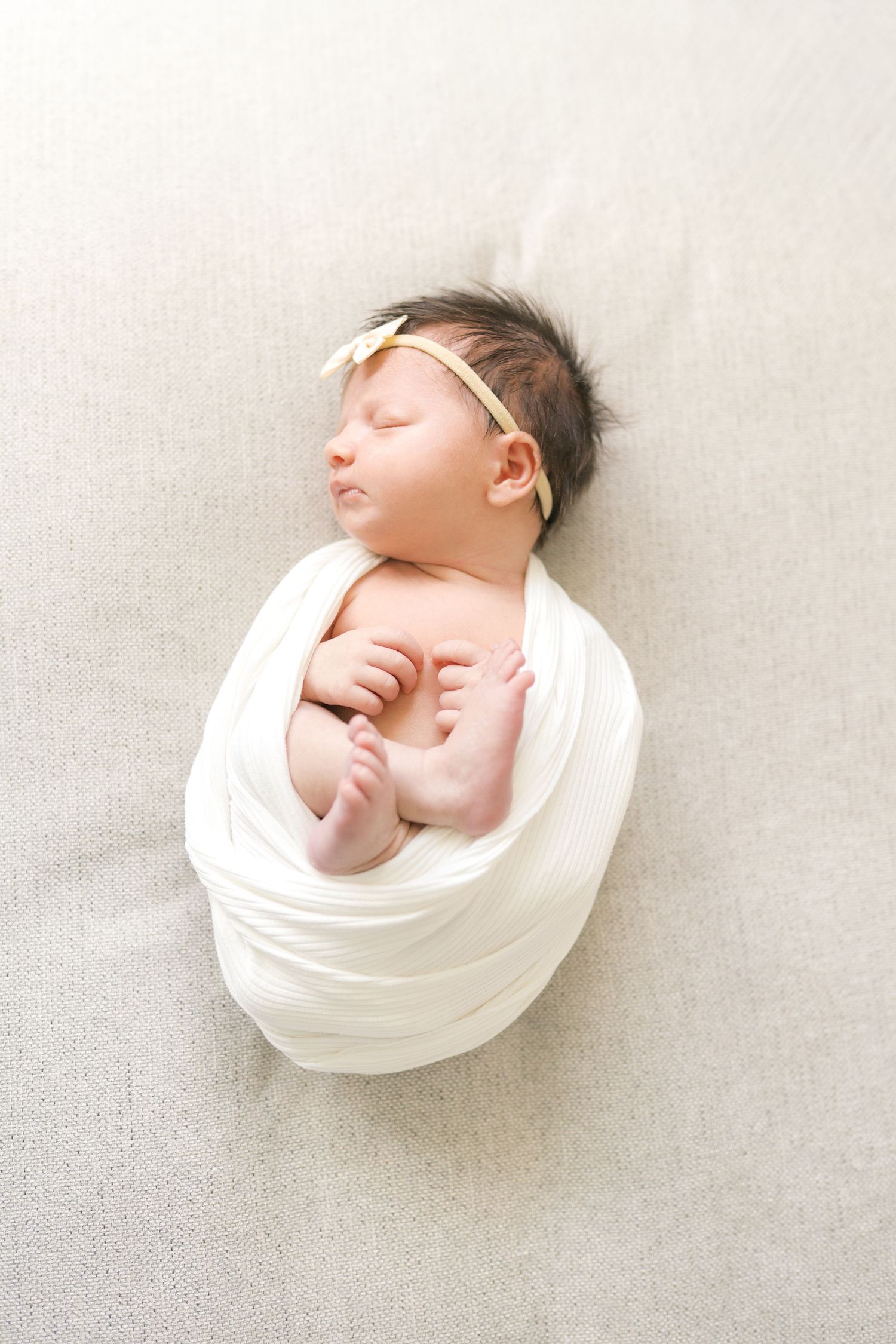 At-home newborn photography session in Valparaiso, Indiana for growing families.