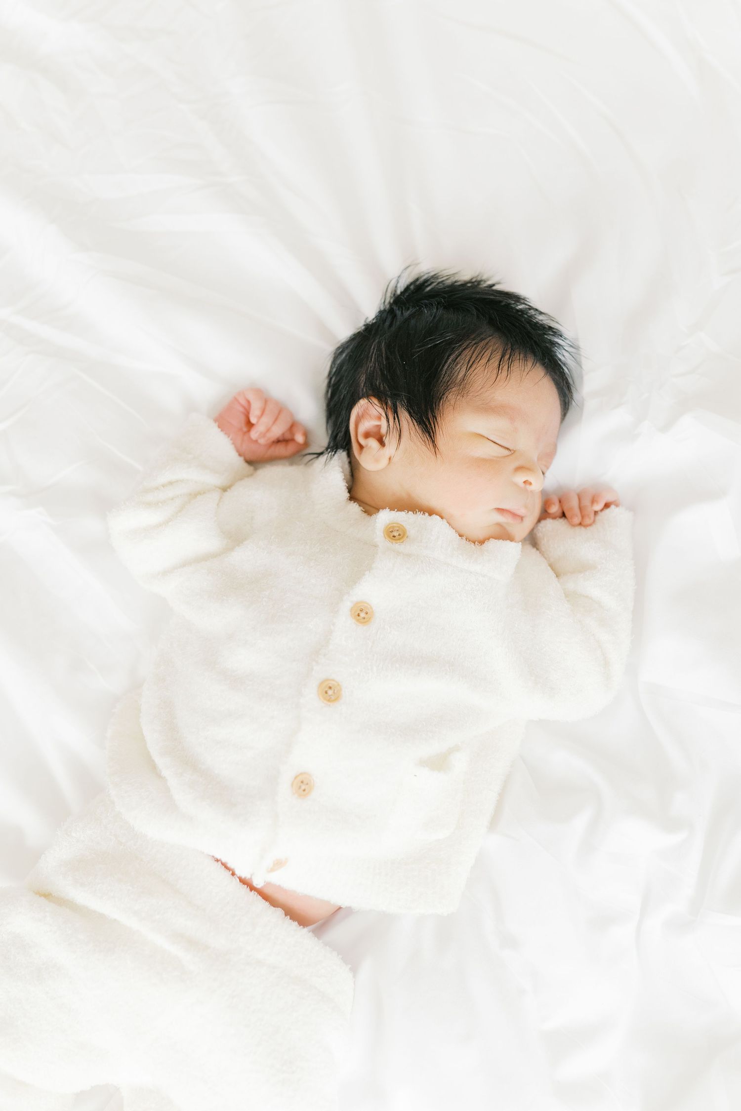 Clean and natural newborn portraits taken in a Valparaiso, Indiana studio for modern mothers.