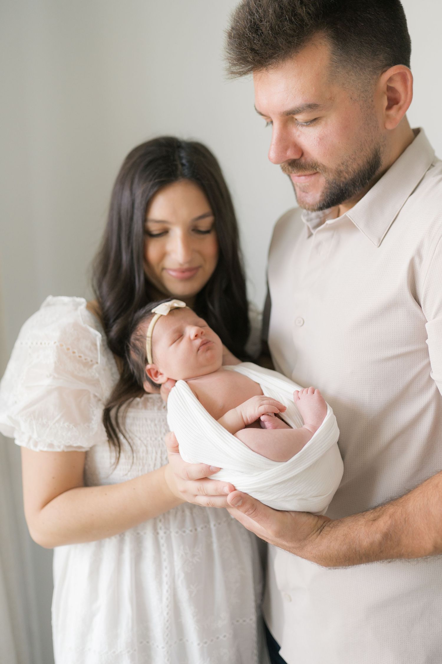Intimate lifestyle newborn photography capturing quiet moments at home in Valparaiso