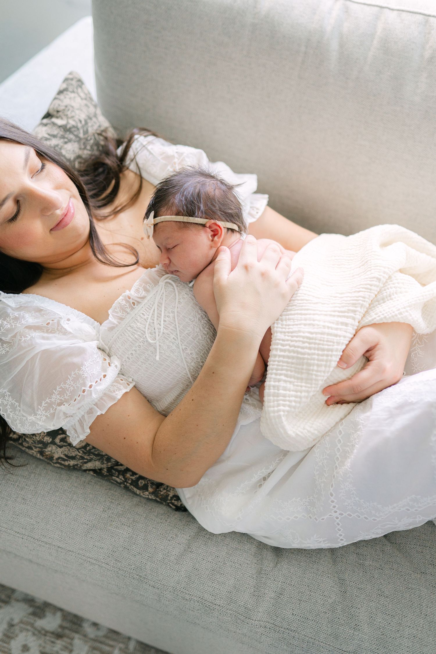 Peaceful newborn sleeping at home during a lifestyle newborn photography session in Valparaiso, Indiana.