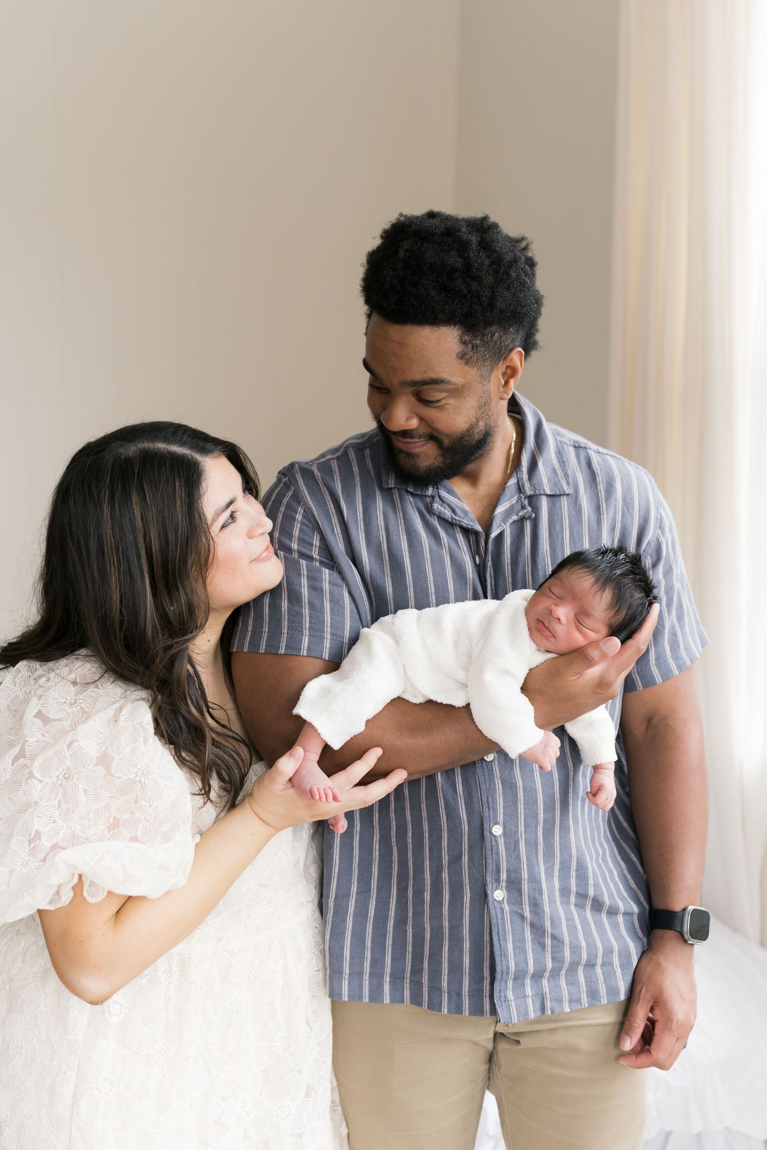 Newborn studio photos taken in Valparaiso, Indiana for expecting and new parents seeking timeless newborn photography.