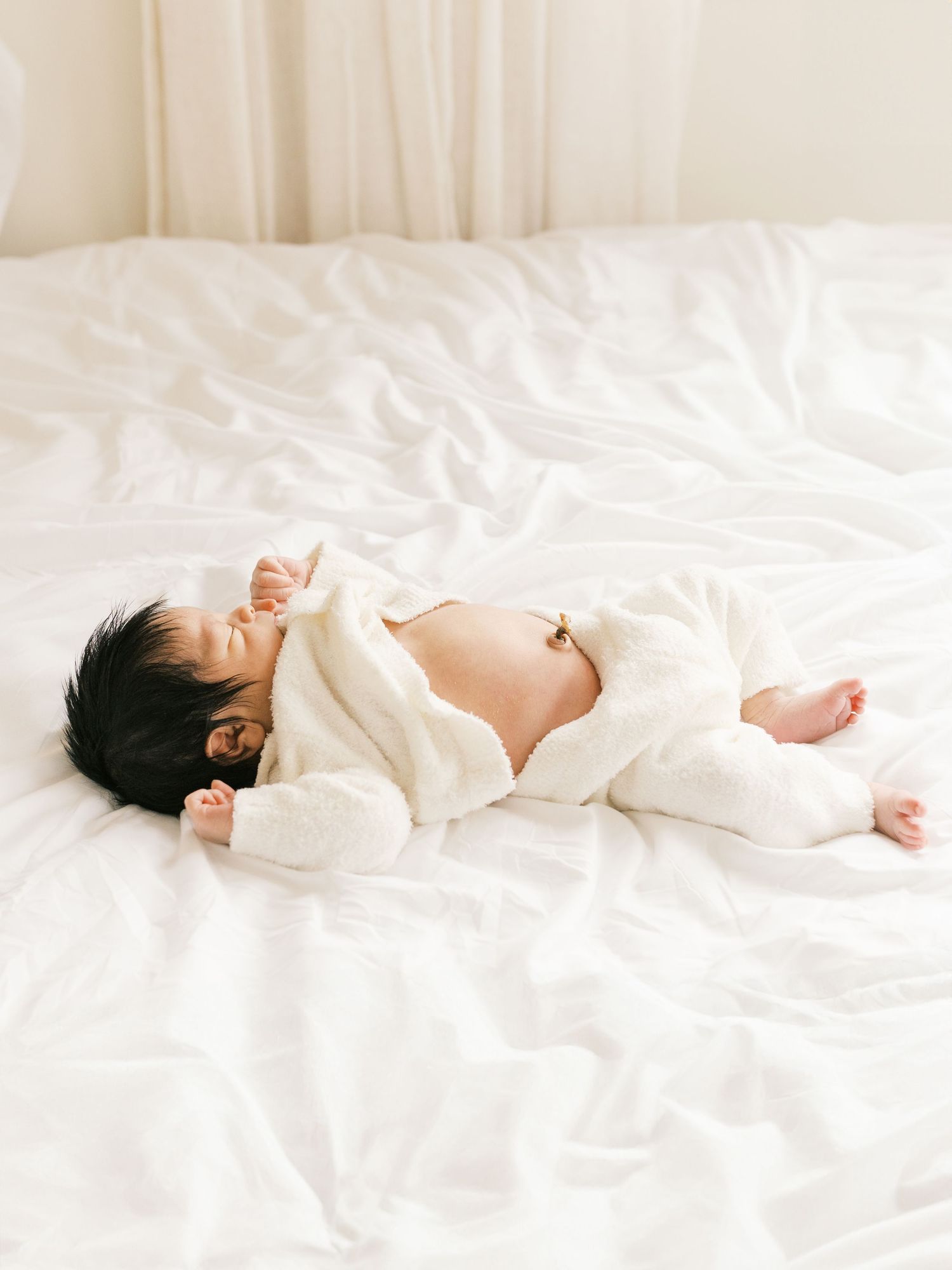 Valparaiso, Indiana newborn photographer capturing soft, natural studio portraits of a newborn baby