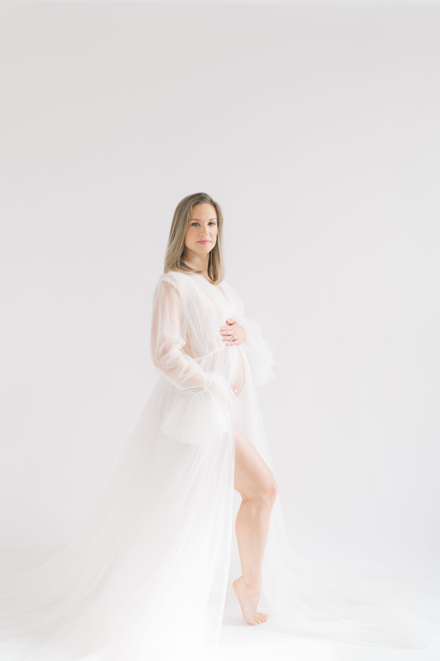 Maternity photography for Chicago and Northwest Indiana mothers in a natural light Valparaiso studio.