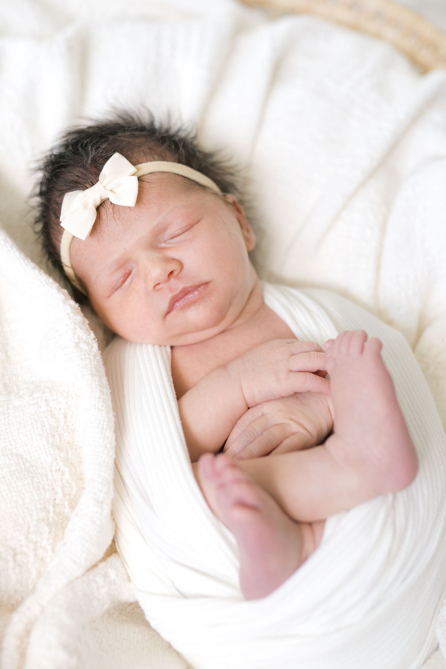 At-home newborn photography session in Valparaiso, Indiana for growing families.