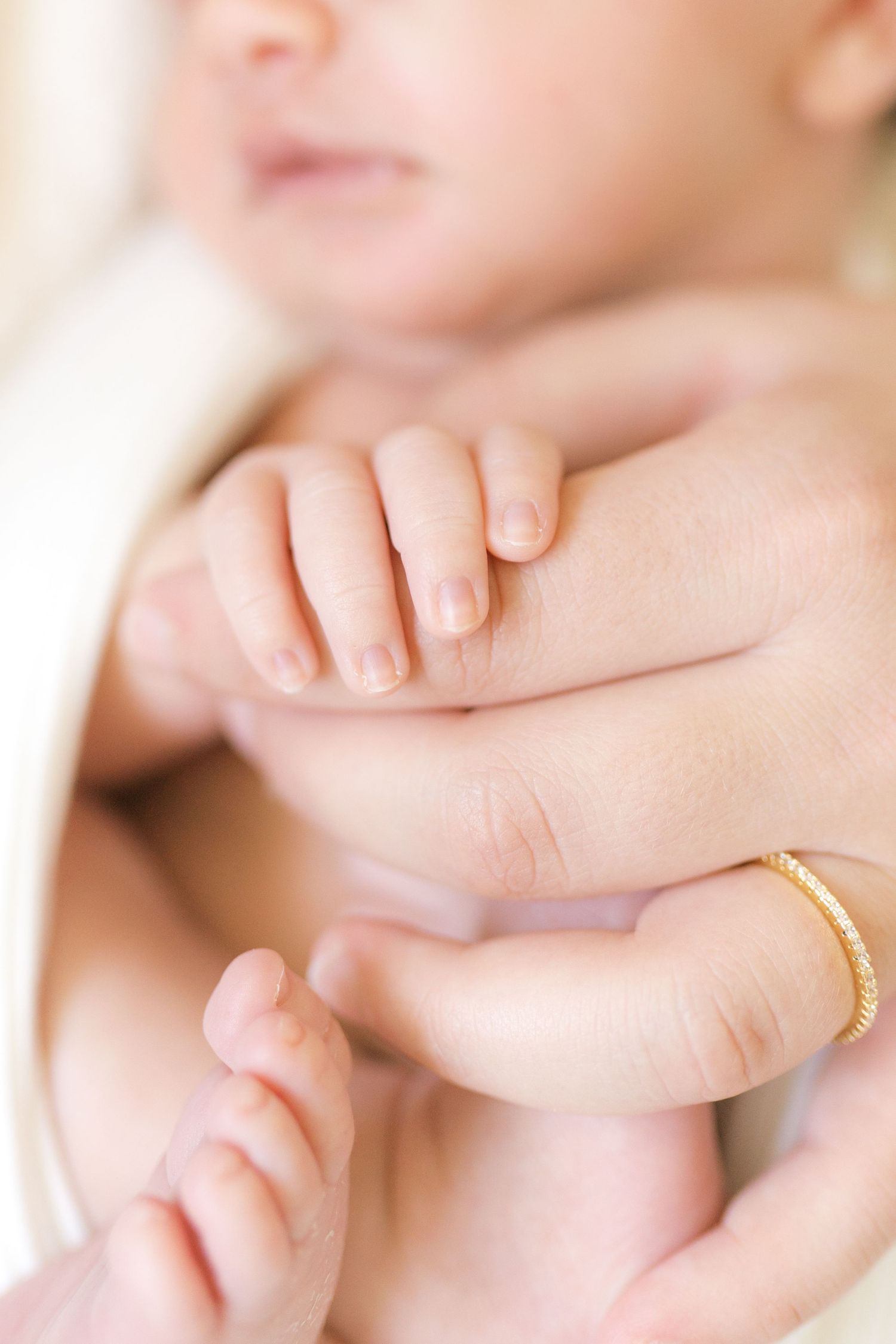 Intimate lifestyle newborn photography capturing quiet moments at home in Valparaiso