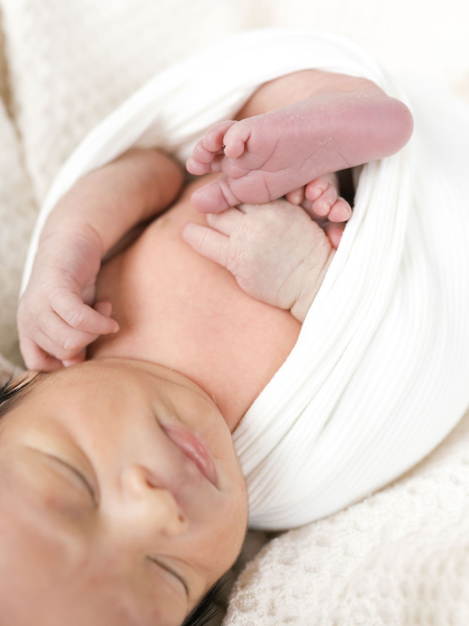 Close-up of newborn baby hands during a studio newborn photography session in Valparaiso, Indiana.