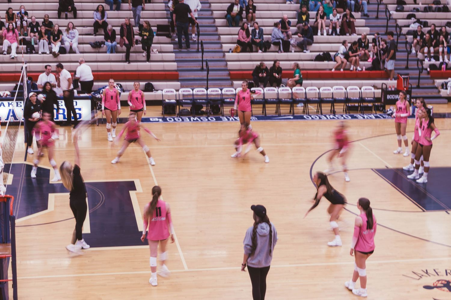 West Linn girls varsity volleyball vs. Lake Oswego, photographed by Miles Butler Photography in Oregon.