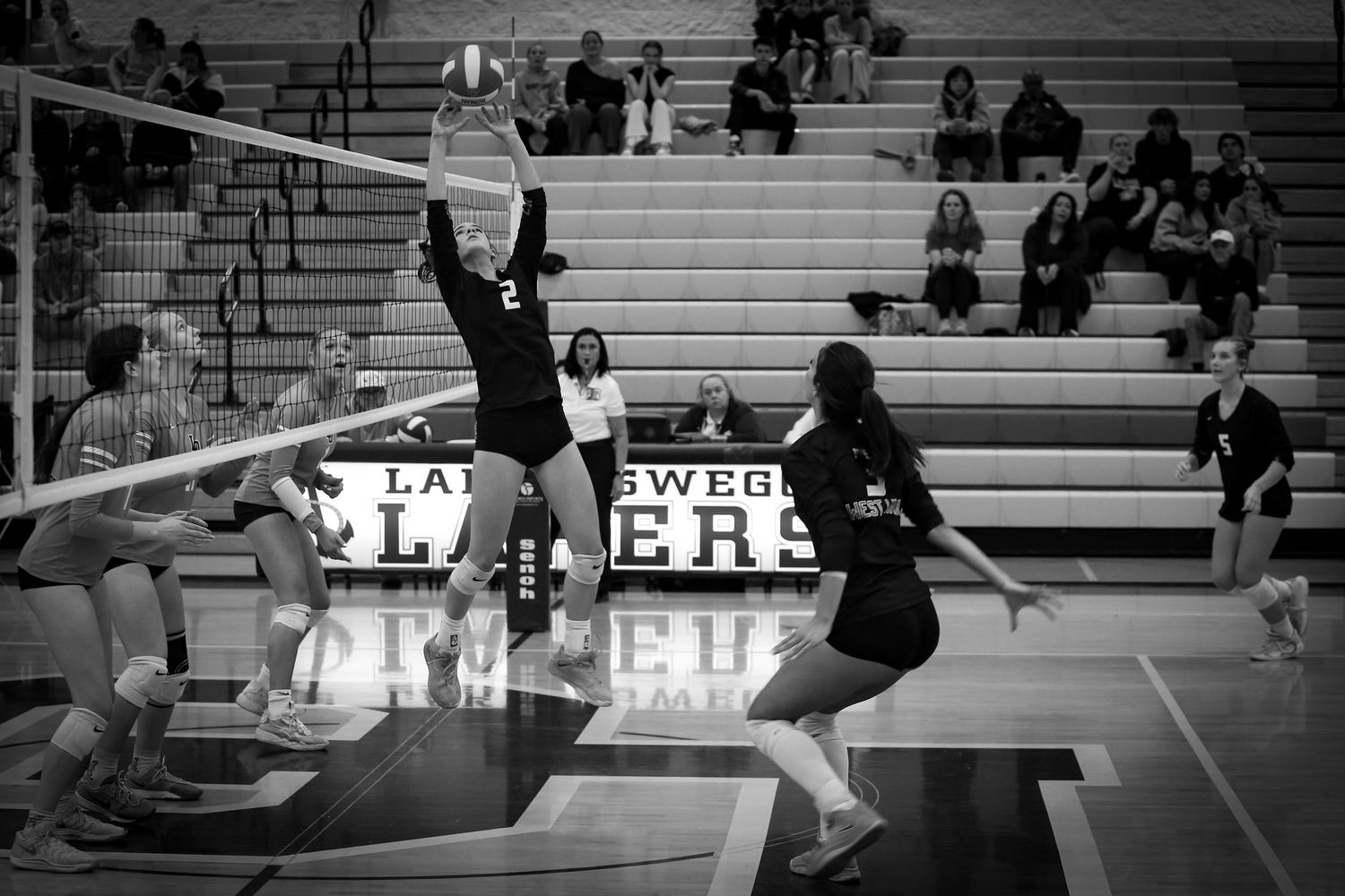 West Linn Lions Varsity Volleyball game photographed by Miles Butler Photography
