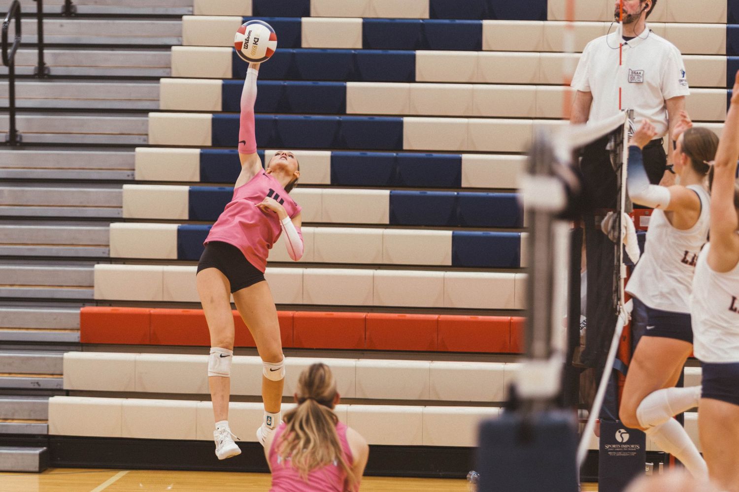 West Linn girls varsity volleyball vs. Lake Oswego, photographed by Miles Butler Photography in Oregon.